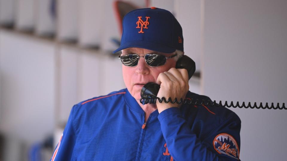 Jul 9, 2023; San Diego, California, USA; New York Mets manager Buck Showalter uses a dugout phone during the first inning against the San Diego Padres at Petco Park. Mandatory Credit: Orlando Ramirez-USA TODAY Sports