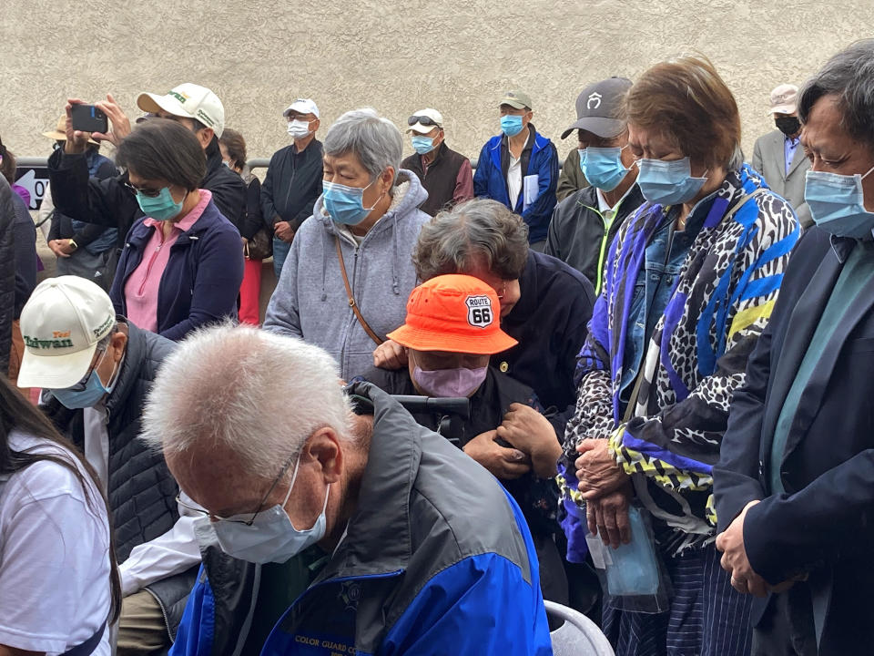 Survivors and church leaders join in prayer and thank community members for their support nearly a week after a deadly shooting at a Taiwanese American church congregation Saturday, May 21, 2022, in Laguna Woods, Calif. The community is reeling after the attack on a luncheon of the Irvine Taiwanese Presbyterian Church that killed one and wounded five. (AP Photo/Amy Taxin)