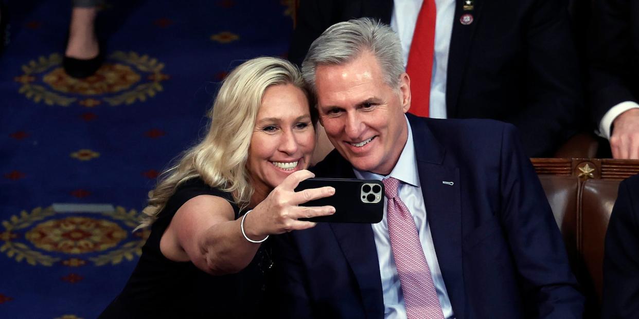 Republican Rep. Marjorie Taylor Greene of Georgia takes a selfie with Kevin McCarthy after his election as speaker of the House.