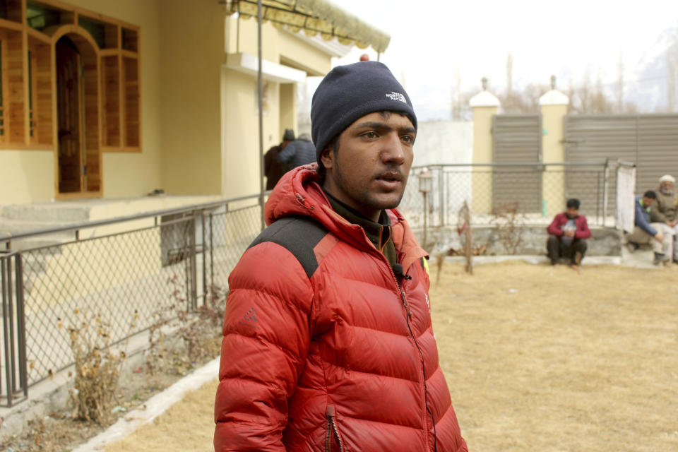 Sajid Ali Sadpara, son of Pakistani missing mountain climber Ali Sadpara, who had begun the climb with his father but was forced to abandon the summit attempt after his equipment failed, talks to local journalists at his house in Skardu, a town in the Gilgit-Baltistan region of northern Pakistan, Monday, Feb. 8, 2021. Families of the three mountaineers who went missing in Pakistan last week while attempting to scale K2, the world's second-highest mountain, were growing more desperate on Tuesday, a day after bad weather halted the search for the climbers. (AP Photo/M.H. Balti)