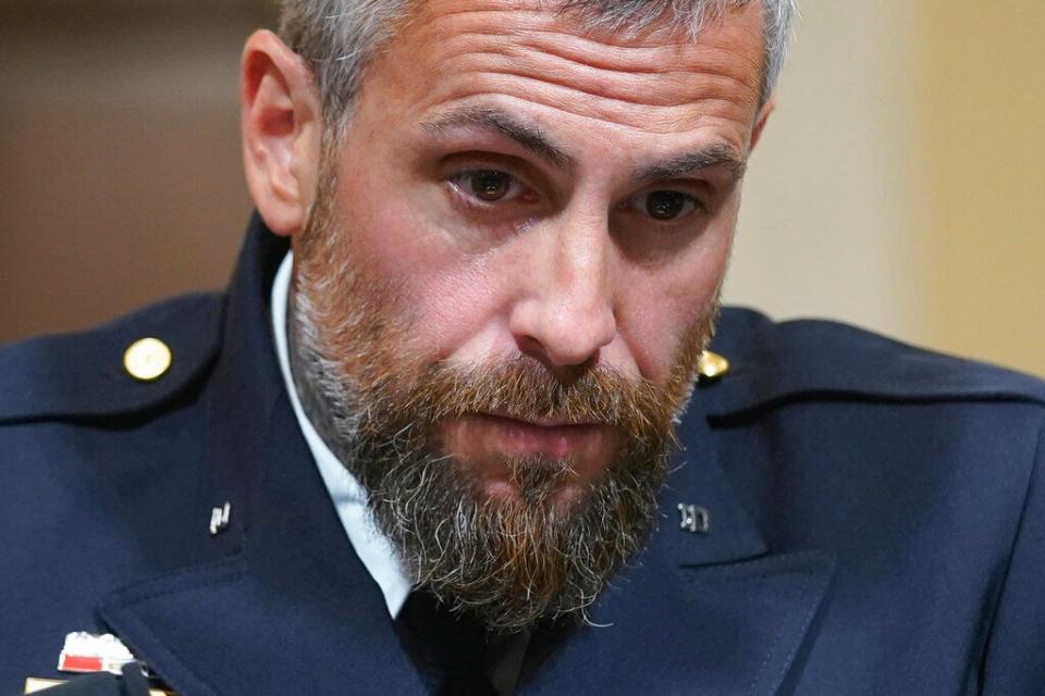 Officer Michael Fanone listens to testimony on July 27, 2021, during the House select committee hearing on the Jan. 6 attack on Capitol Hill.