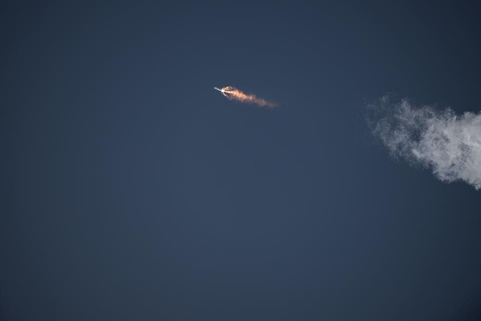 SpaceX's starship soars through the air during its first test flight on April 20, 2023