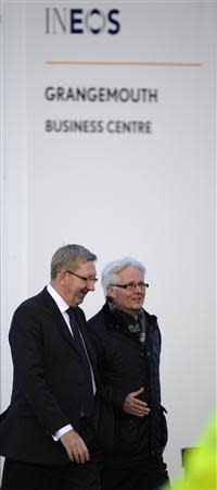 Len McCluskey (L), general secretary of the Unite union and union representative Pat Rafferty leave a meeting in Grangemouth, Scotland October 24, 2013. Union leaders will make concessions and accept some demands from the owners of the Grangemouth refinery in a bid to avert closures of the Scottish refinery and the nearby petrochemical plant local media reported. REUTERS/Russell Cheyne