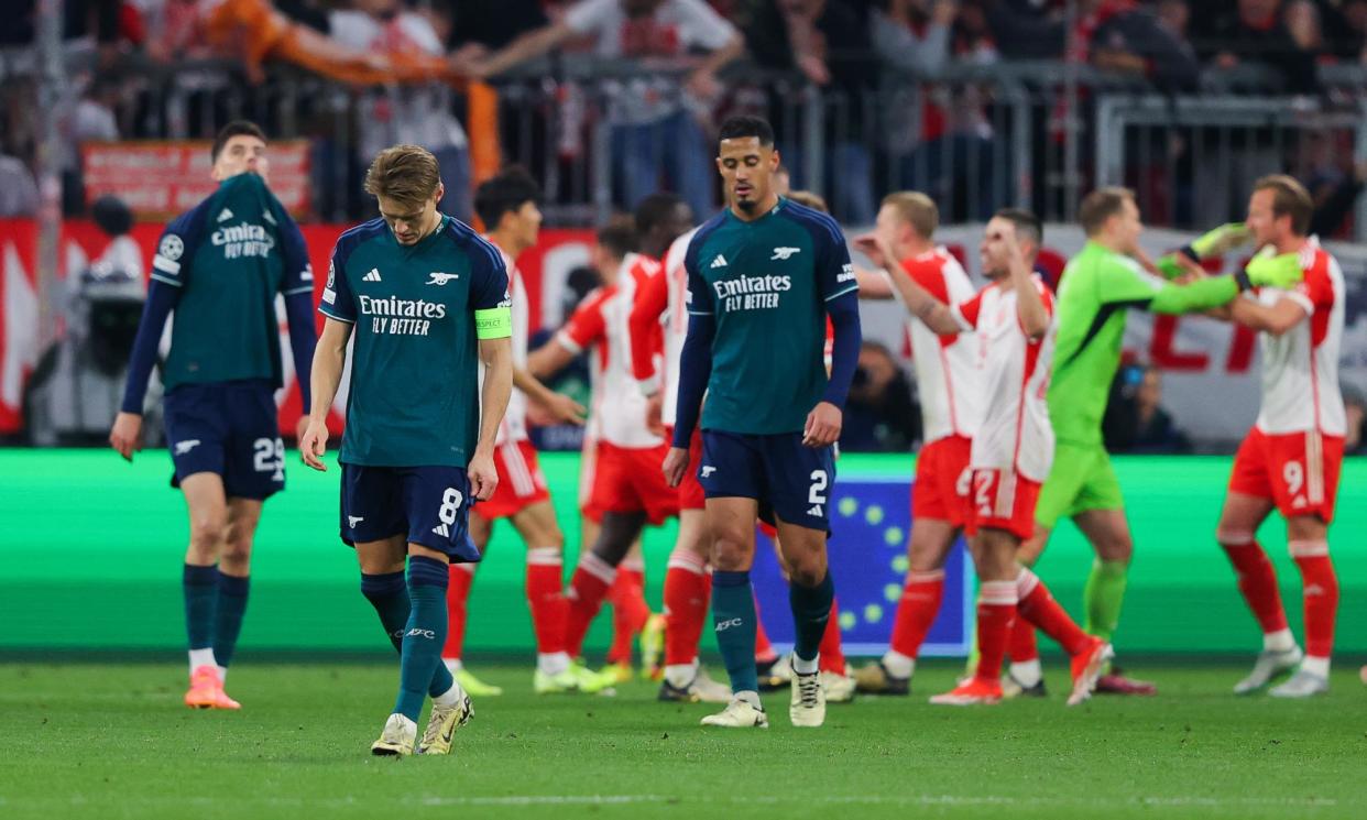 <span>From left: Kai Havertz, Martin Ødegaard and William Saliba cannot hide their despair as Harry Kane (far right) and his Bayern Munich teammates celebrate Champions League progress.</span><span>Photograph: James Gill/Danehouse/Getty Images</span>