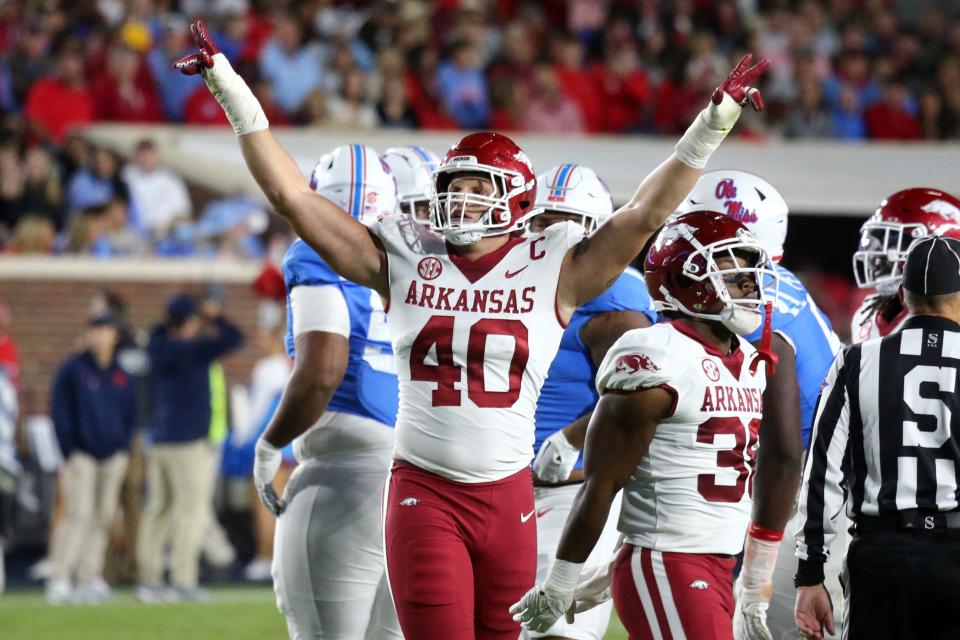 Oct 7, 2023; Oxford, Mississippi, USA; Arkansas Razorbacks defensive linemen Landon Jackson (40) reacts after a made field goal during the first half against the Mississippi Rebels at Vaught-Hemingway Stadium. Mandatory Credit: Petre Thomas-USA TODAY Sports