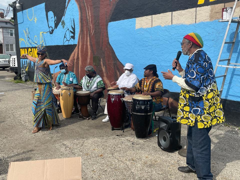 Charles "Is Said" Lyons performed at the unveiling of a mural commemorating 50 years of the Uhuru Dance Company in 2021 on the Near East Side.