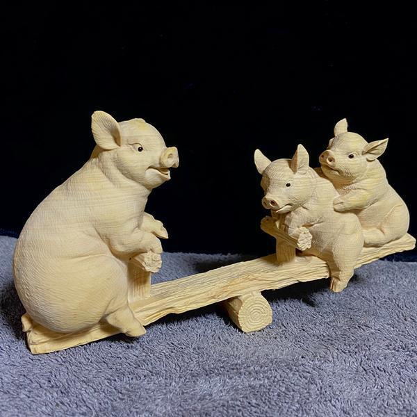 黃楊木雕家居茶桌擺件坐翹翹板豬動物生肖豬汽車中控臺工藝品