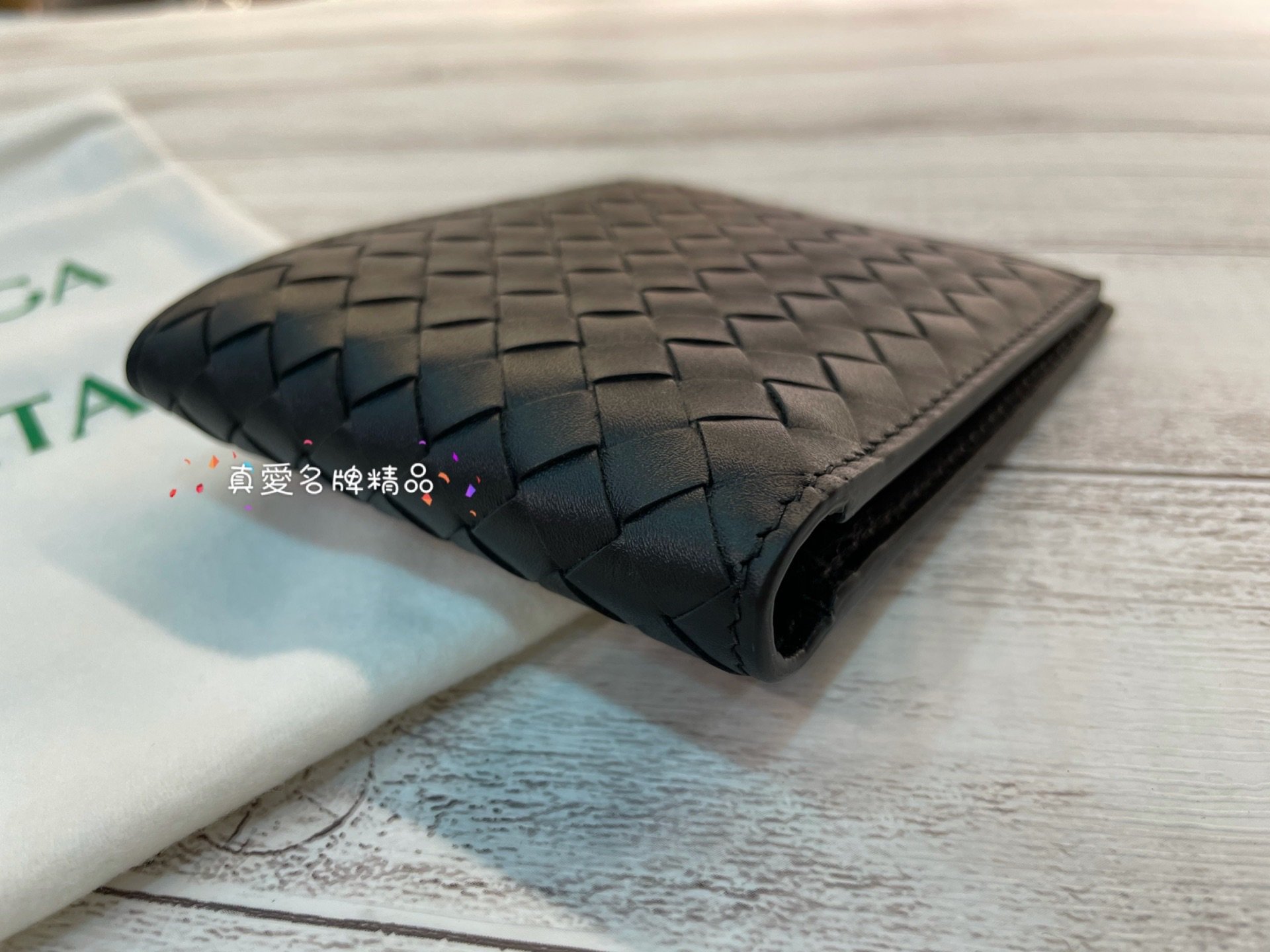 真愛名牌精品》Bottega Veneta (BV)113993 1000編織黑色8卡短夾**全