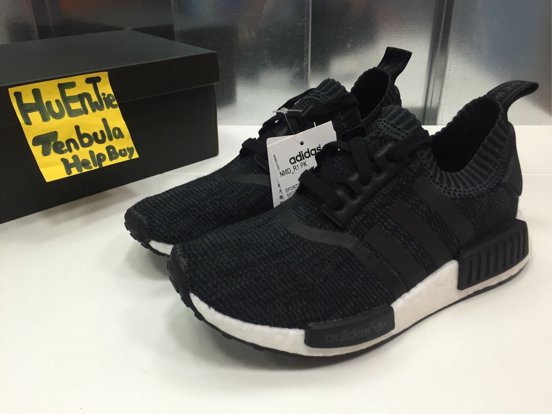 nmd r1 black wool