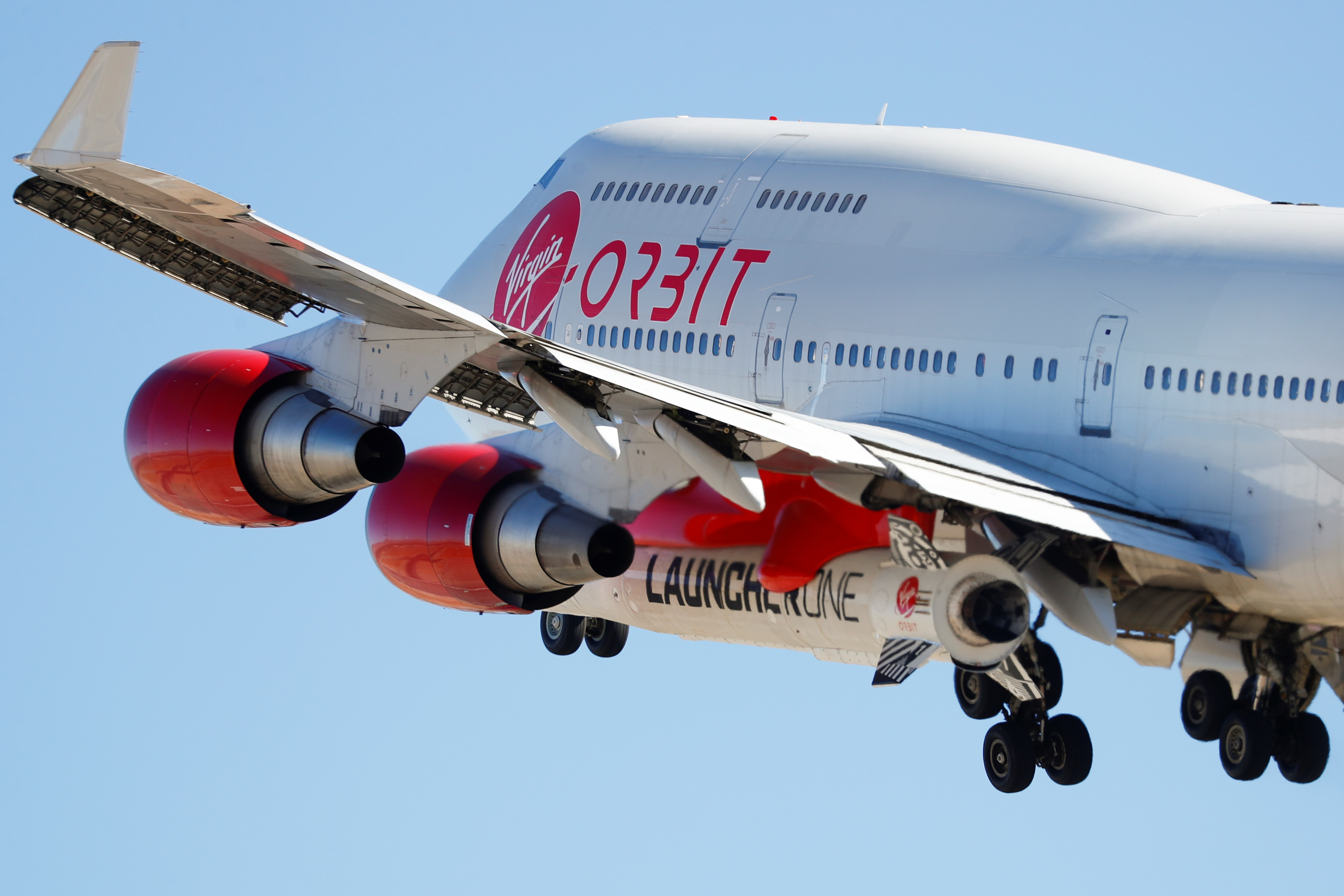 Richard Branson's Virgin Orbit, with a rocket underneath the wing of a modified Boeing 747 jetliner, takes off to for a key drop test of its high-altitude launch system for satellites from Mojave, California, U.S. July 10, 2019. REUTERS/Mike Blake