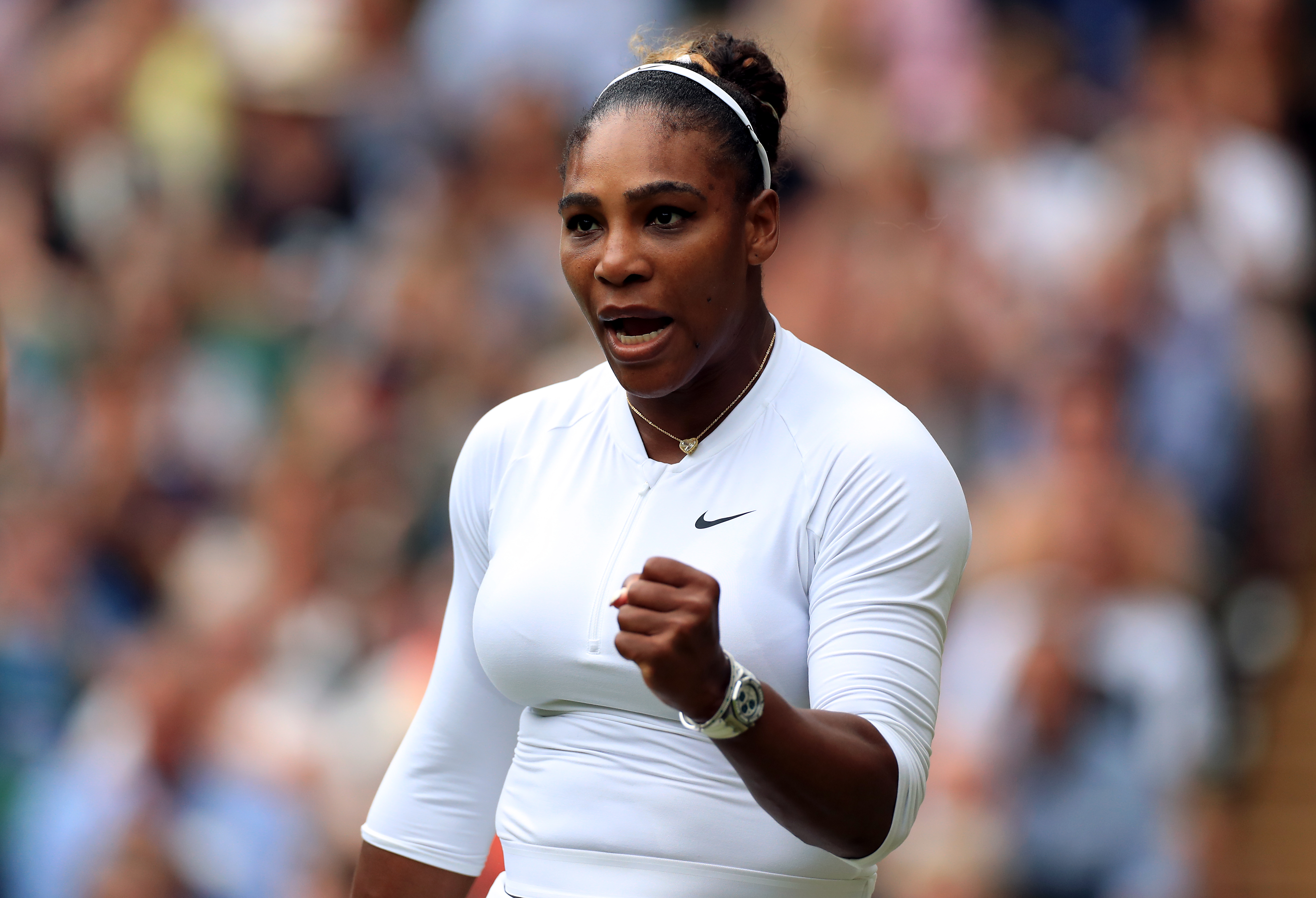 Serena Williams during her mixed doubles match with Andy Murray on day eight of the Wimbledon Championships at the All England Lawn Tennis and Croquet Club, Wimbledon.