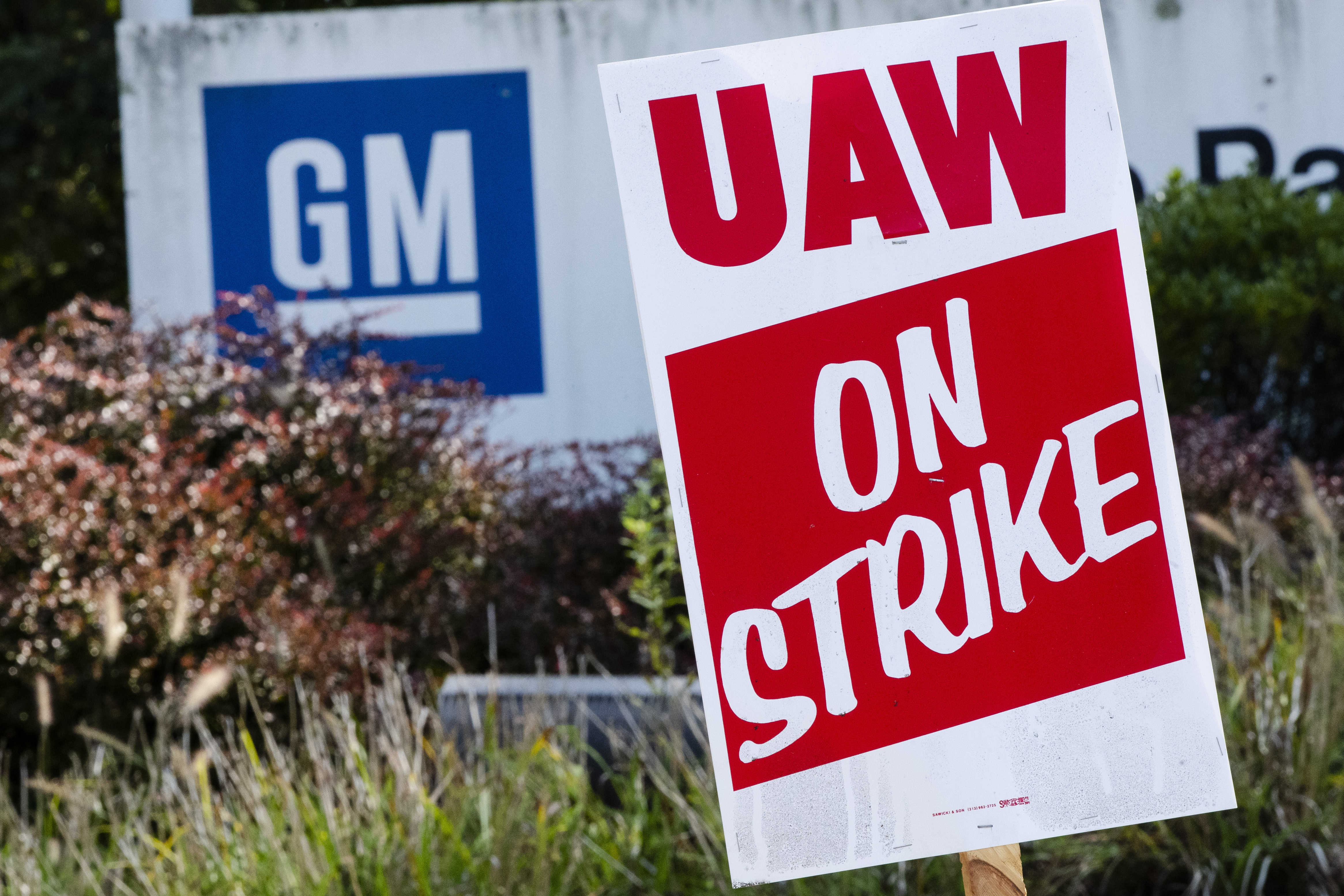 The Latest: GM talks hit snag over job security guarantees