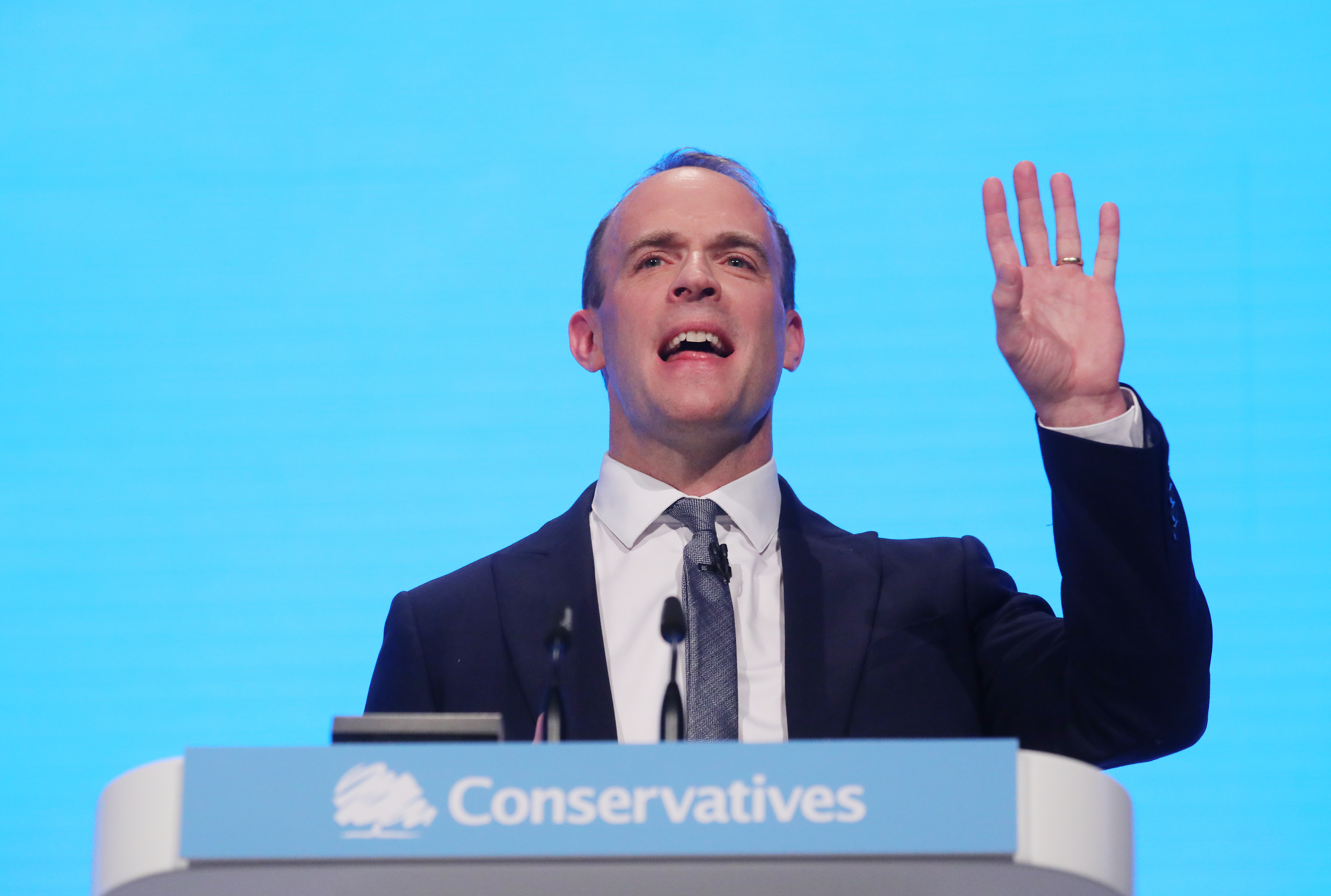 Foreign Secretary Dominic Raab delivers a speech during the "Delivering Brexit" session on day one of the Conservative Party Conference being held at the Manchester Convention Centre