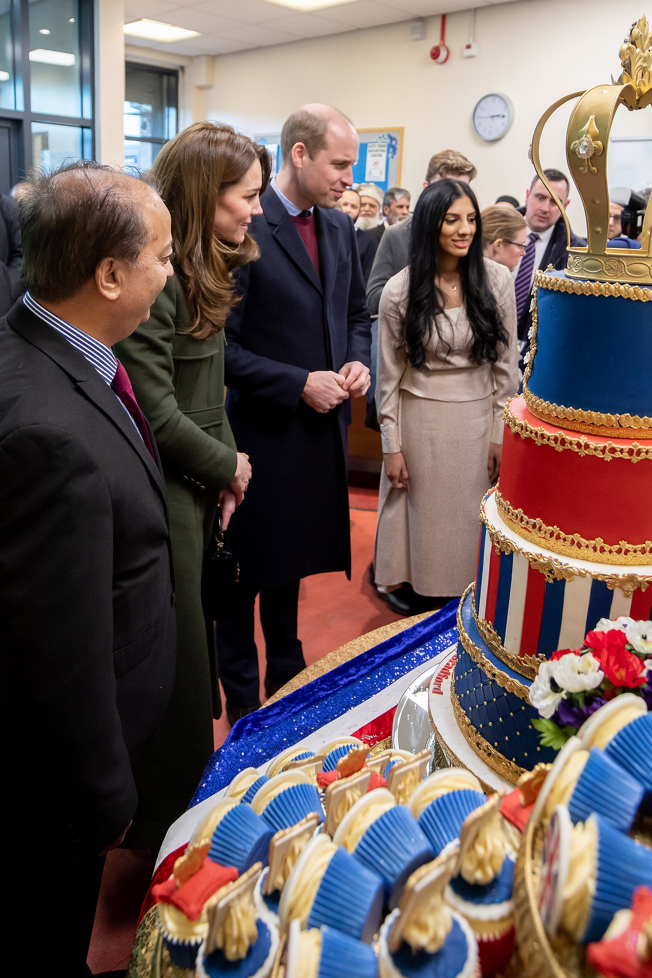 BRADFORD, ENGLAND - JANUARY 15: Prince William, Duke of Cambridge and Catherine, Duchess of Cambridge inspect cakes as they visit the Khidmat Centre on January 15, 2020 in Bradford, United Kingdom. (Photo by Charlotte Graham - WPA Pool/Getty Images)