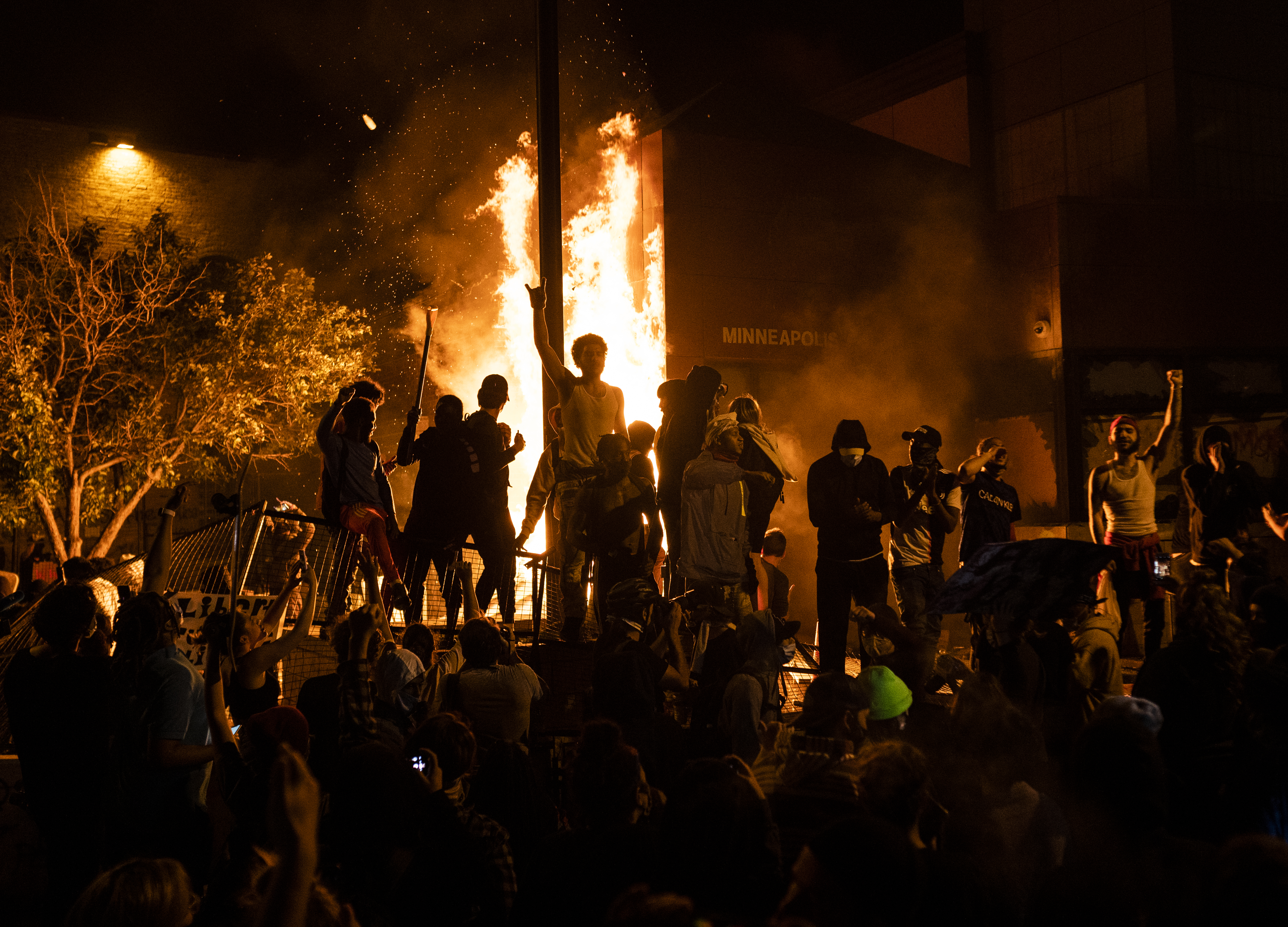 George Floyd protesters set Minneapolis police station afire