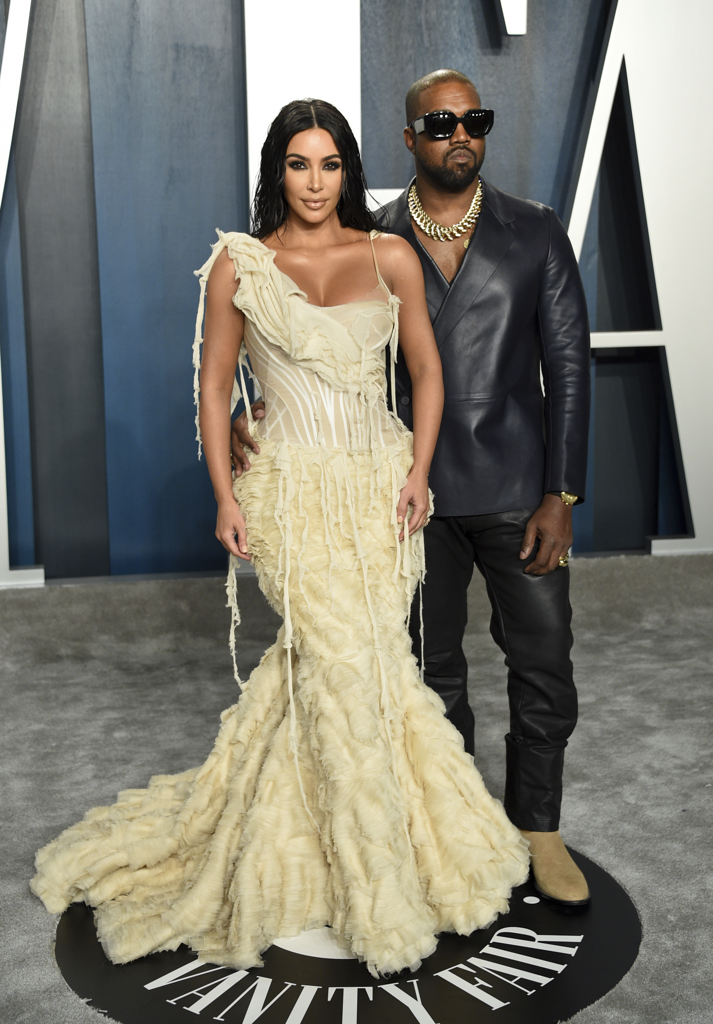 Kim Kardashian West, left, and Kanye West arrive at the Vanity Fair Oscar Party on Sunday, Feb. 9, 2020, in Beverly Hills, Calif. (Photo by Evan Agostini/Invision/AP)