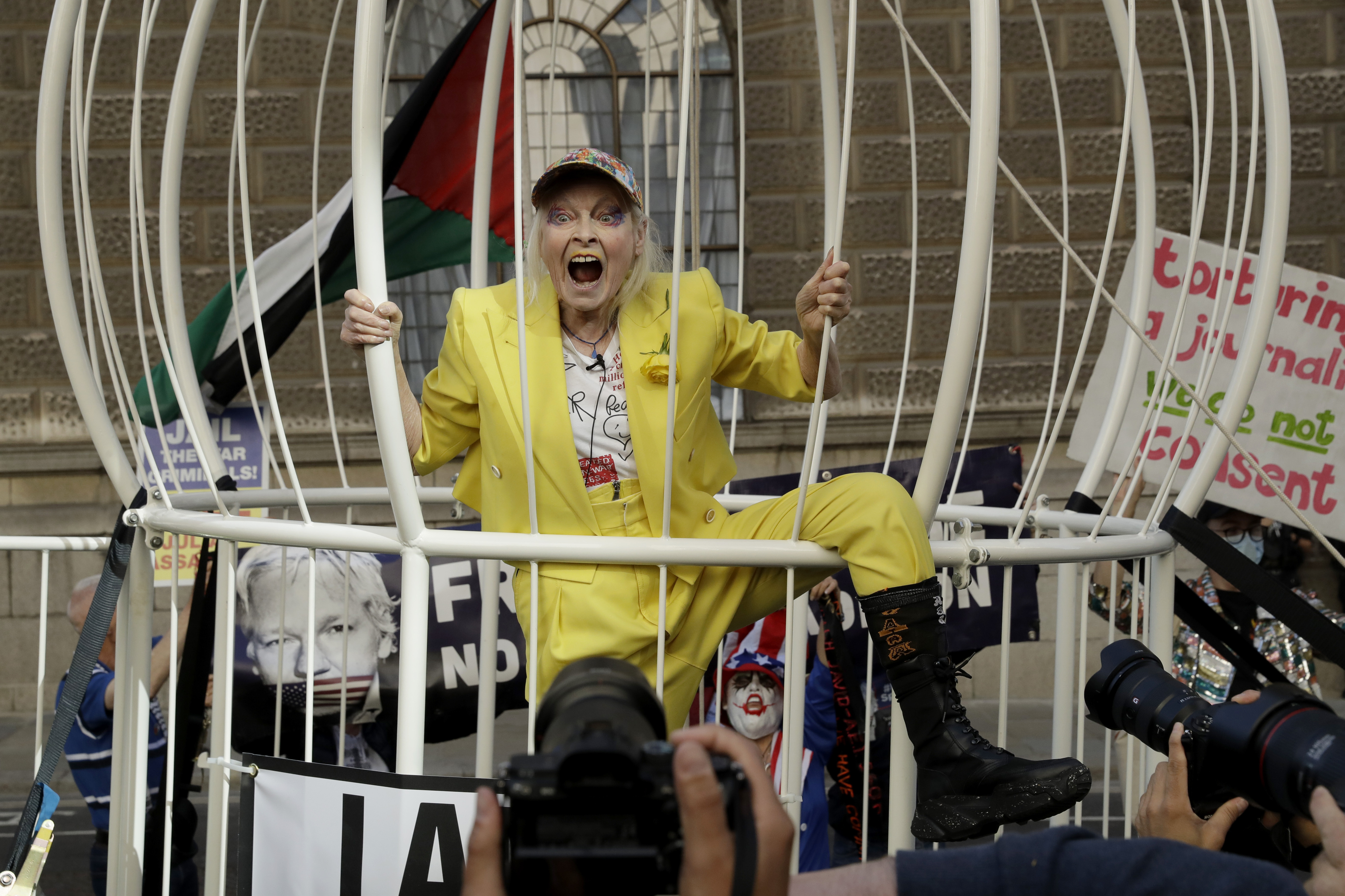 Vivienne Westwood locks herself in cage in protest against Julian Assange's  US extradition