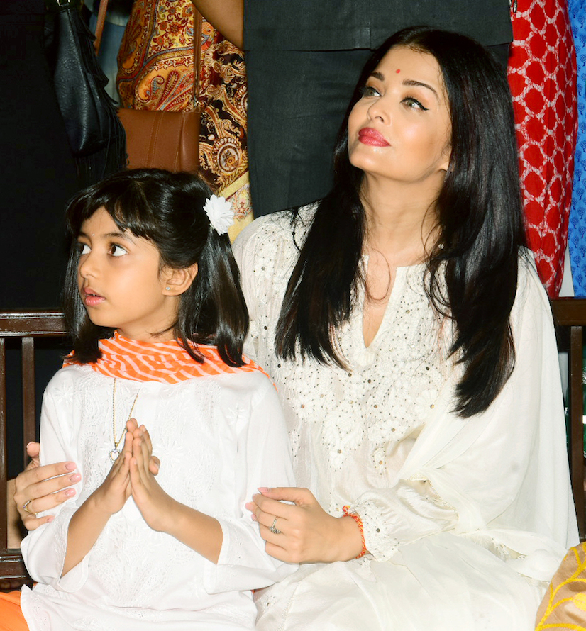 Aishwarya Rai Bachchan is a doting mother at Durga Puja