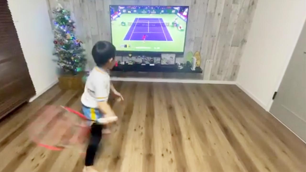 Young Brothers Mimic Roger Federer In Front Of Tv