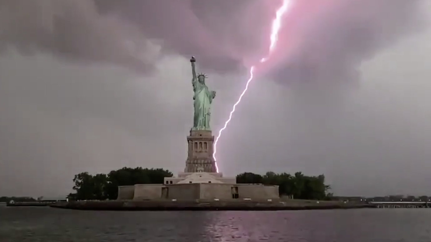 Lightning Strikes Near Statue of Liberty During Severe New York City Storms