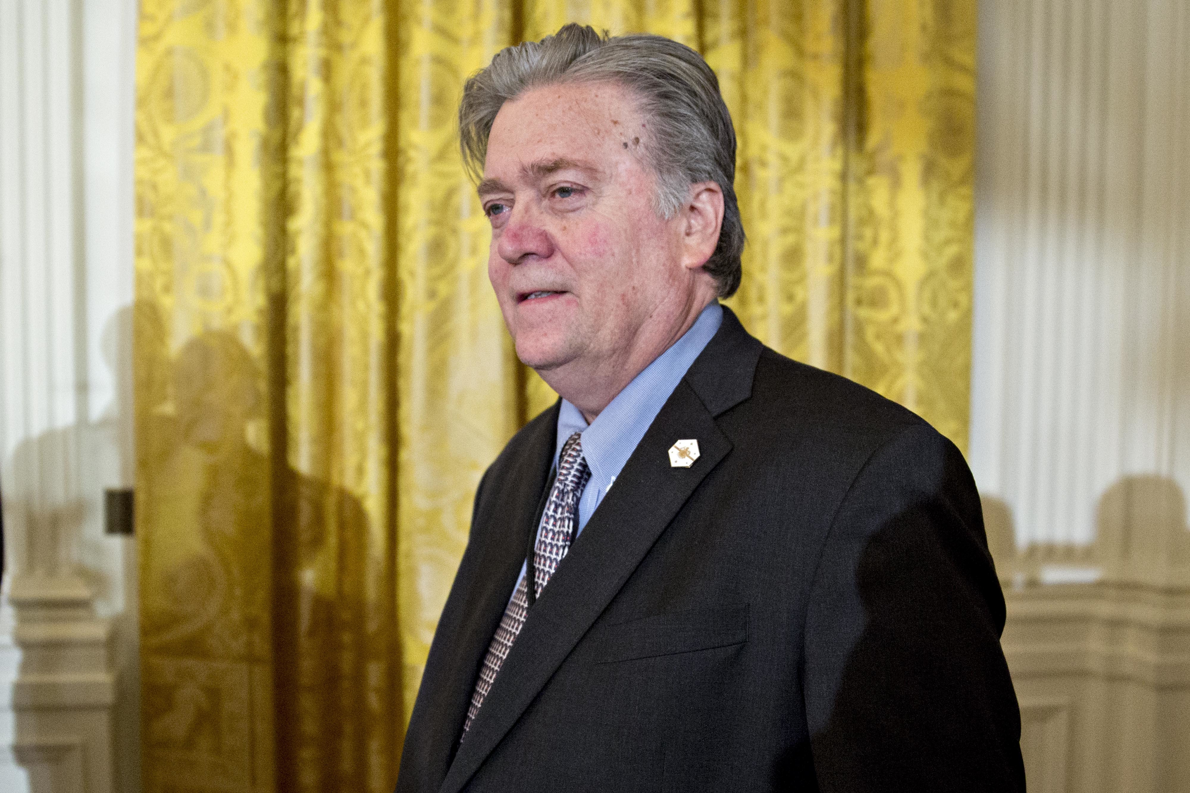 Stephen "Steve" Bannon, chief strategist for U.S. President Donald Trump, arrives to a swearing in ceremony of White House senior staff in the East Room of the White House in Washington, D.C., U.S., on Sunday, Jan. 22, 2017. Trump today mocked protesters who gathered for large demonstrations across the U.S. and the world on Saturday to signal discontent with his leadership, but later offered a more conciliatory tone, saying he recognized such marches as a Òhallmark of our democracy.Ó (Photo by Andrew Harrer/Pool) *** Please Use Credit from Credit Field ***