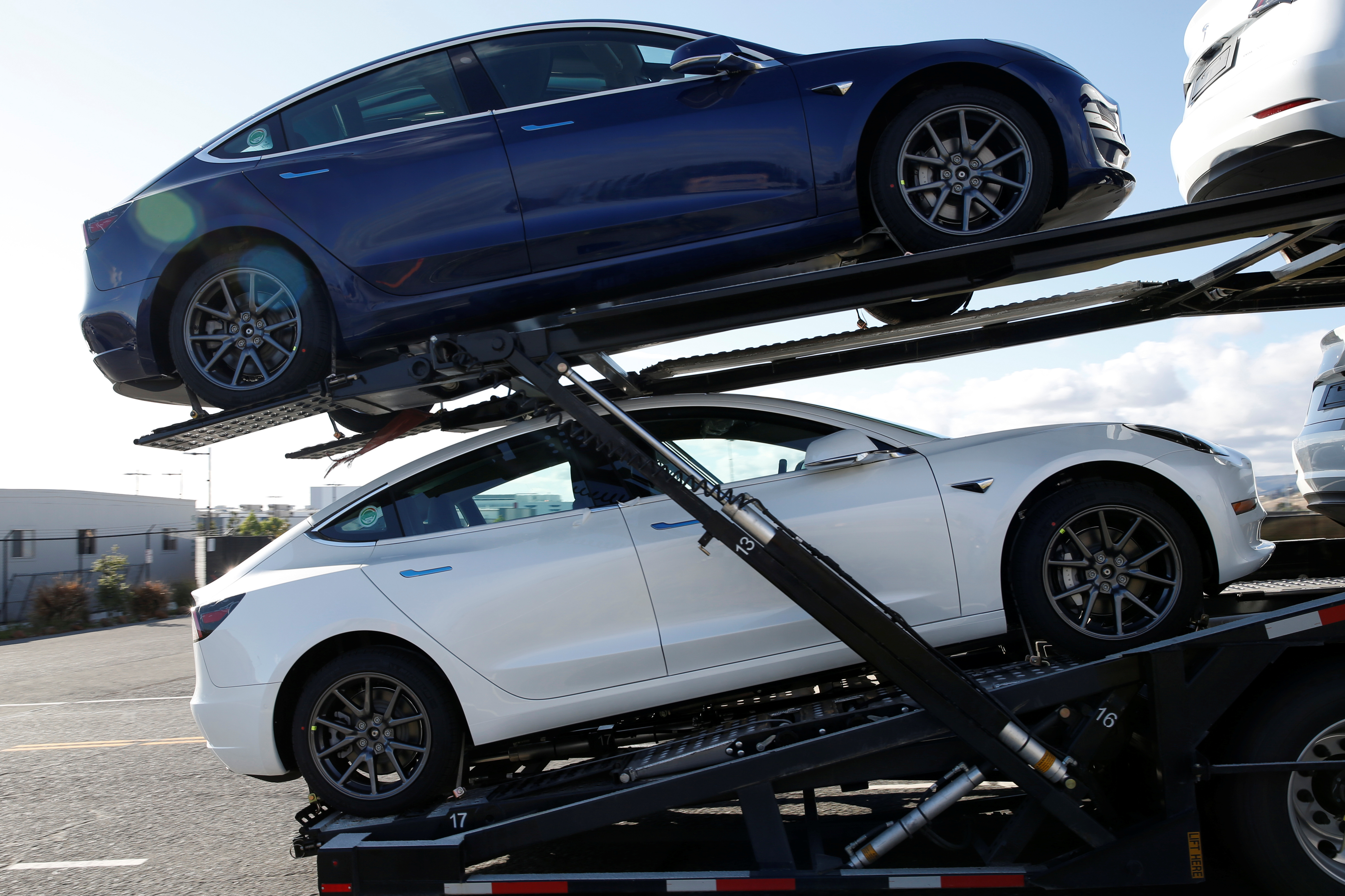 photo of Tesla refunded customers who were charged twice for their cars image