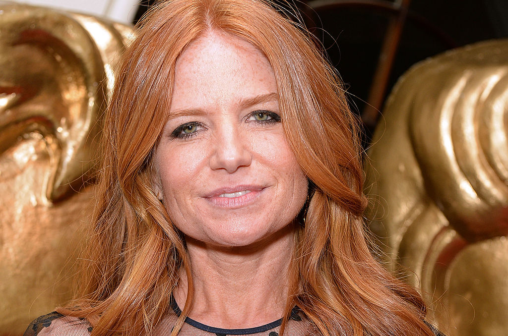 embraces the ageing process after revealing her famous red locks are turning grey