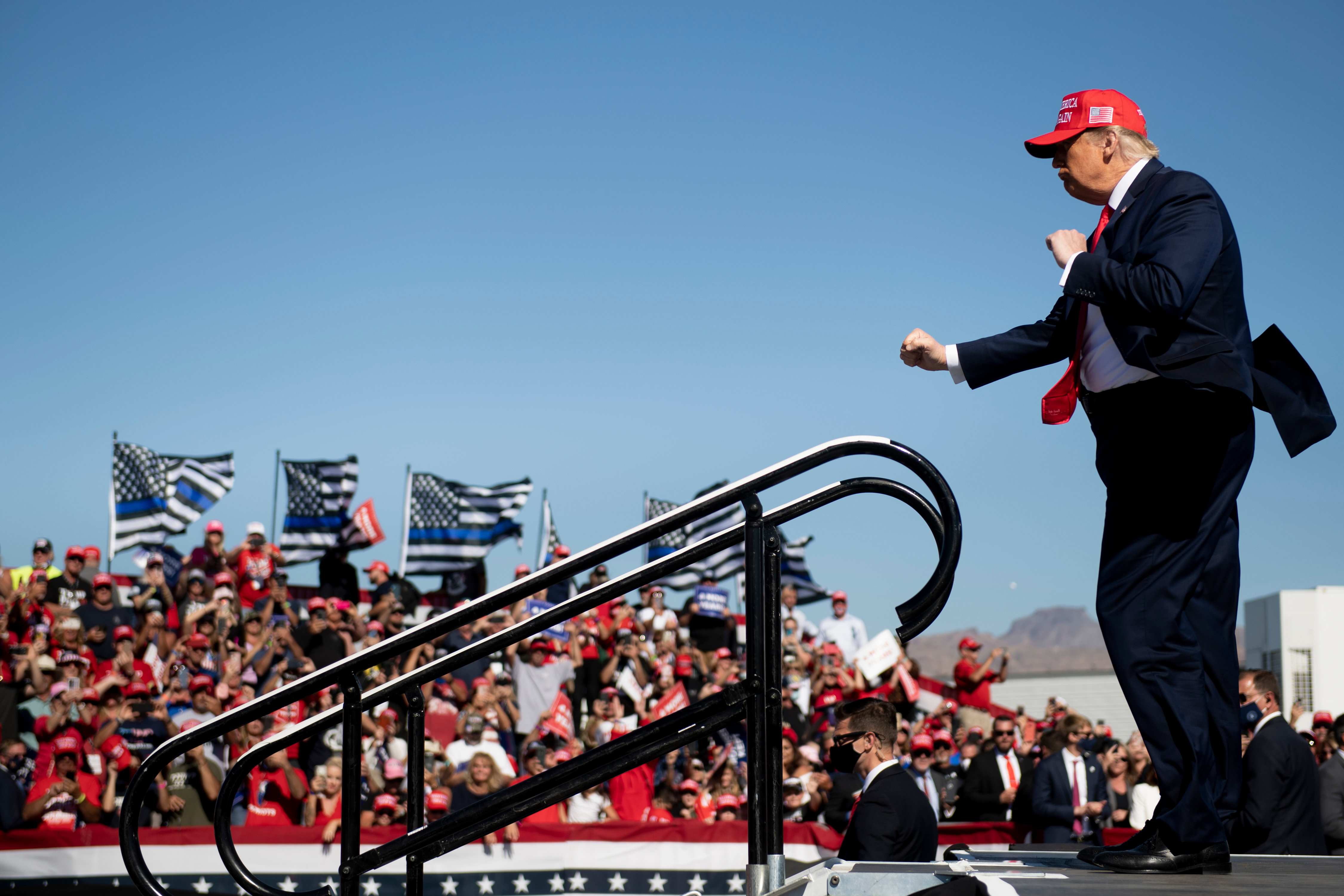 US President Donald Trump dances as he leaves after speaking during a Make America Great Again rally at Laughlin/Bullhead International Airport October 28, 2020, in Bullhead City, Arizona. (Photo by Brendan Smialowski / AFP) (Photo by BRENDAN SMIALOWSKI/AFP via Getty Images)