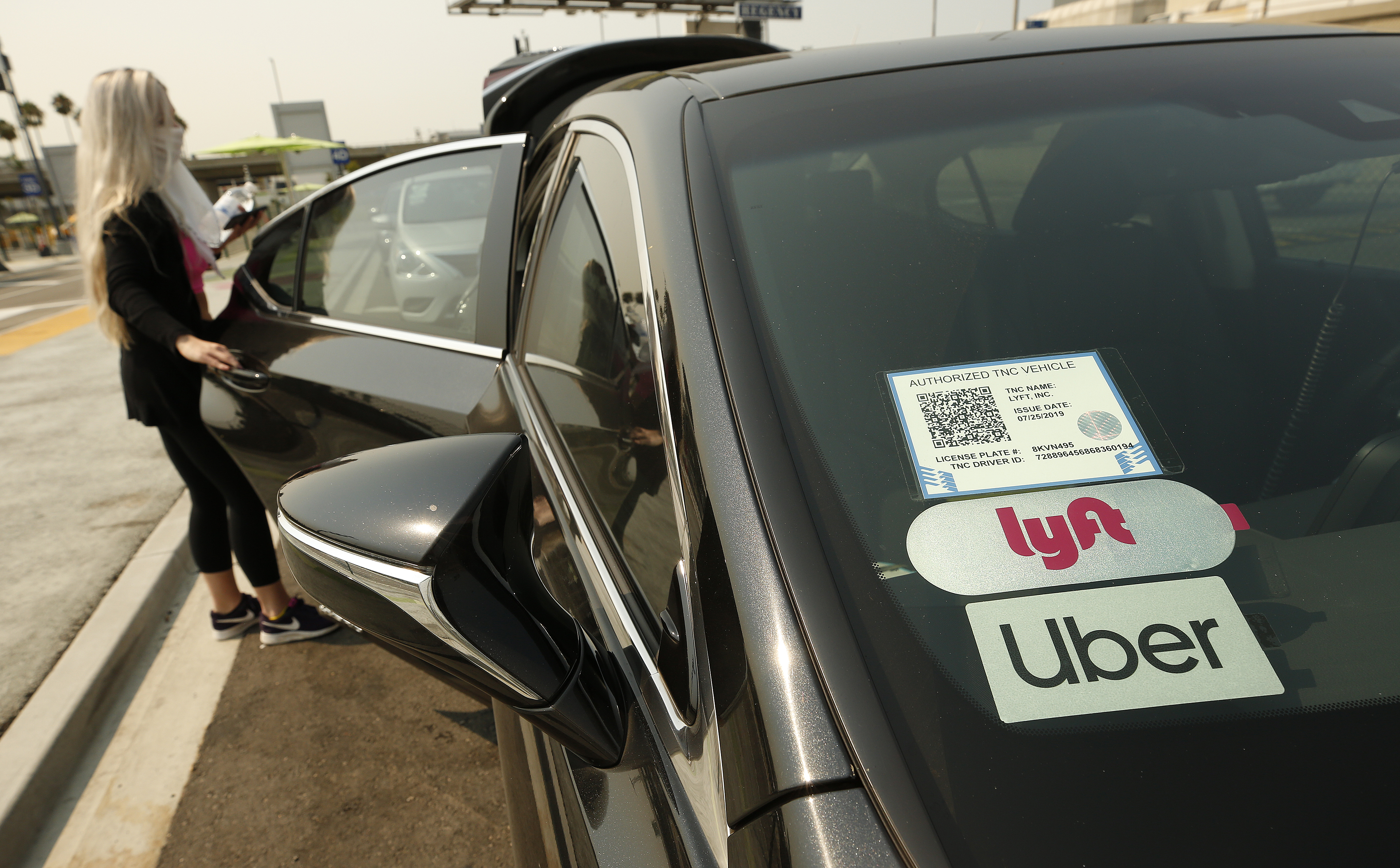 California votes to exempt Uber and Lyft from classifying drivers 