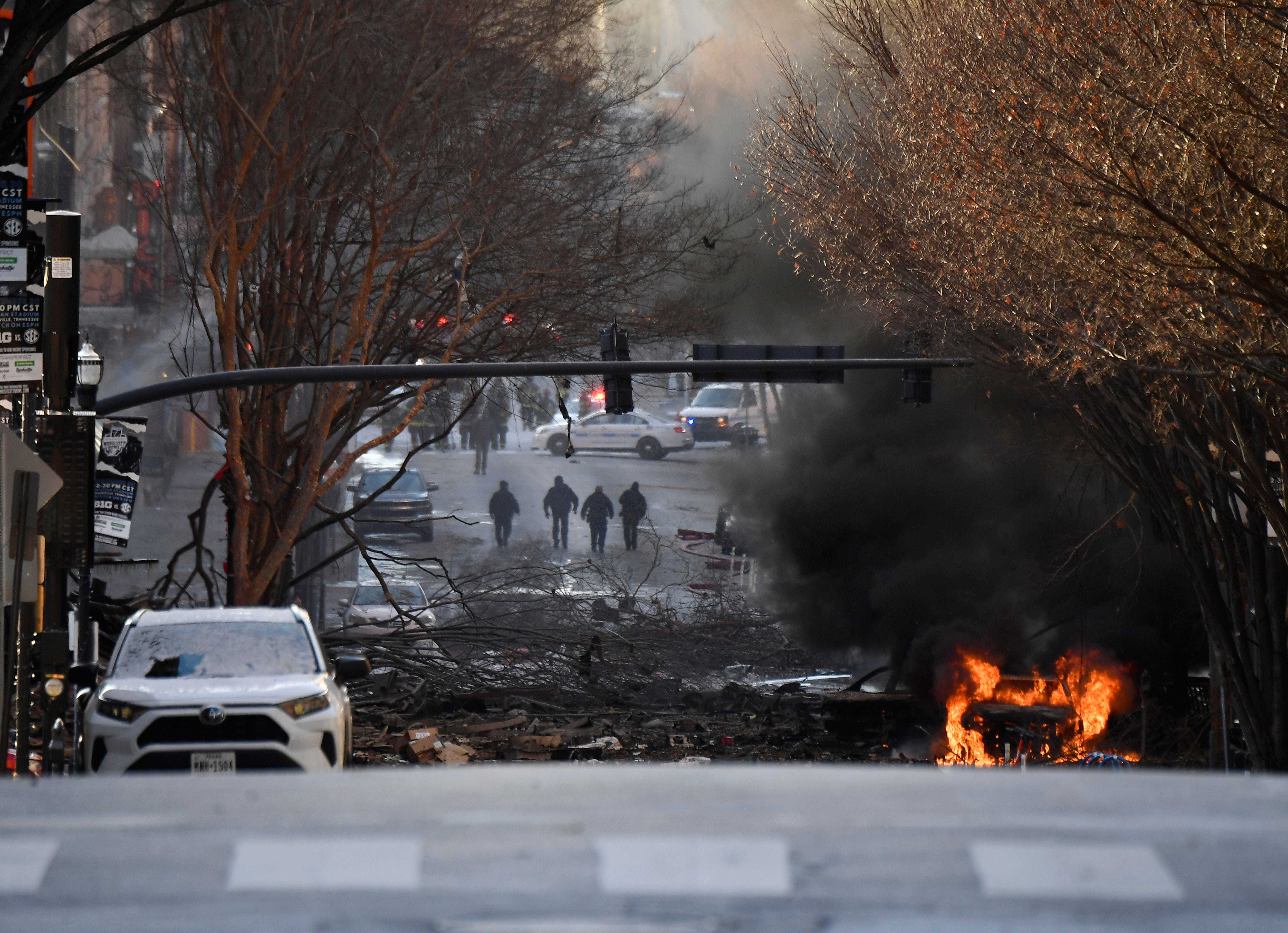 Dec 25, 2020; Nashville, TN, USA; A vehicle is on fire after an explosion in the area of Second and Commerce Friday, Dec. 25, 2020 in Nashville, Tenn. Mandatory Credit: Andrew Nelles-USA TODAY NETWORK/Sipa USA