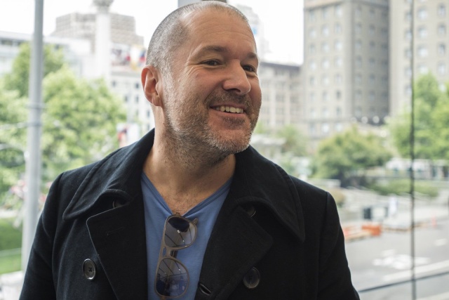 Jonathan "Jony" Ive, chief design officer for Apple Inc., speaks with attendees during the grand opening of the company's new flagship store at Union Square in San Francisco, California, U.S., on Saturday, May 21, 2016. The flagship location boasts 40-foot-tall doors opening onto the square and comprises five departments, or what Apple prefers to call "features." Photographer: David Paul Morris/Bloomberg *** Local Caption *** Jony Ive