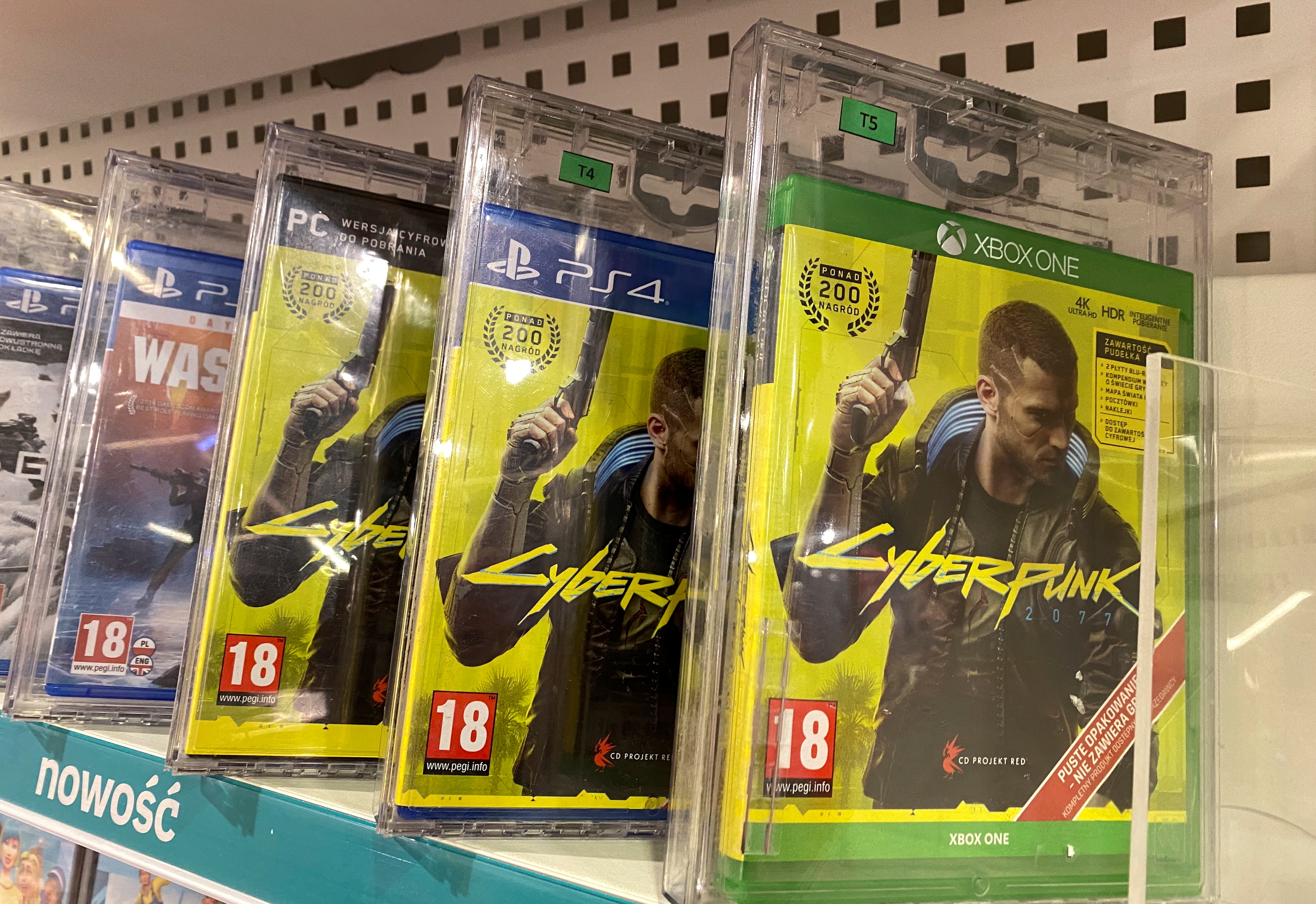 Boxes with CD Projekt's game Cyberpunk 2077 are displayed in Warsaw, Poland, December 14, 2020. REUTERS/Kacper Pempel