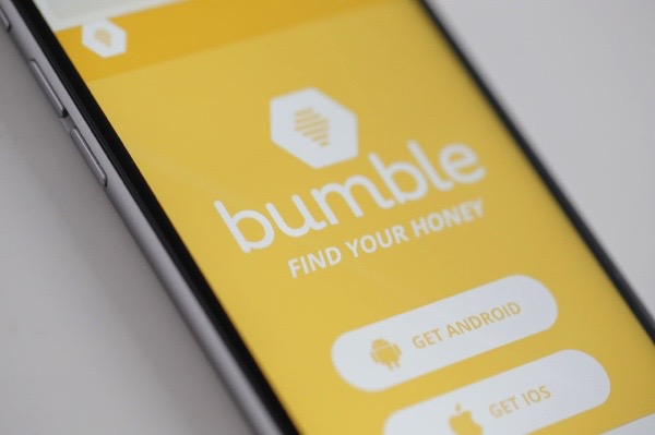 The Bumble app is seen on an iPhone on 16 March, 2017. The app is resembles Tindr in that it let's heterosexuals find each other however Bumble only lets female users start a conversation after interested parties have made a match. (Photo by Jaap Arriens/NurPhoto)