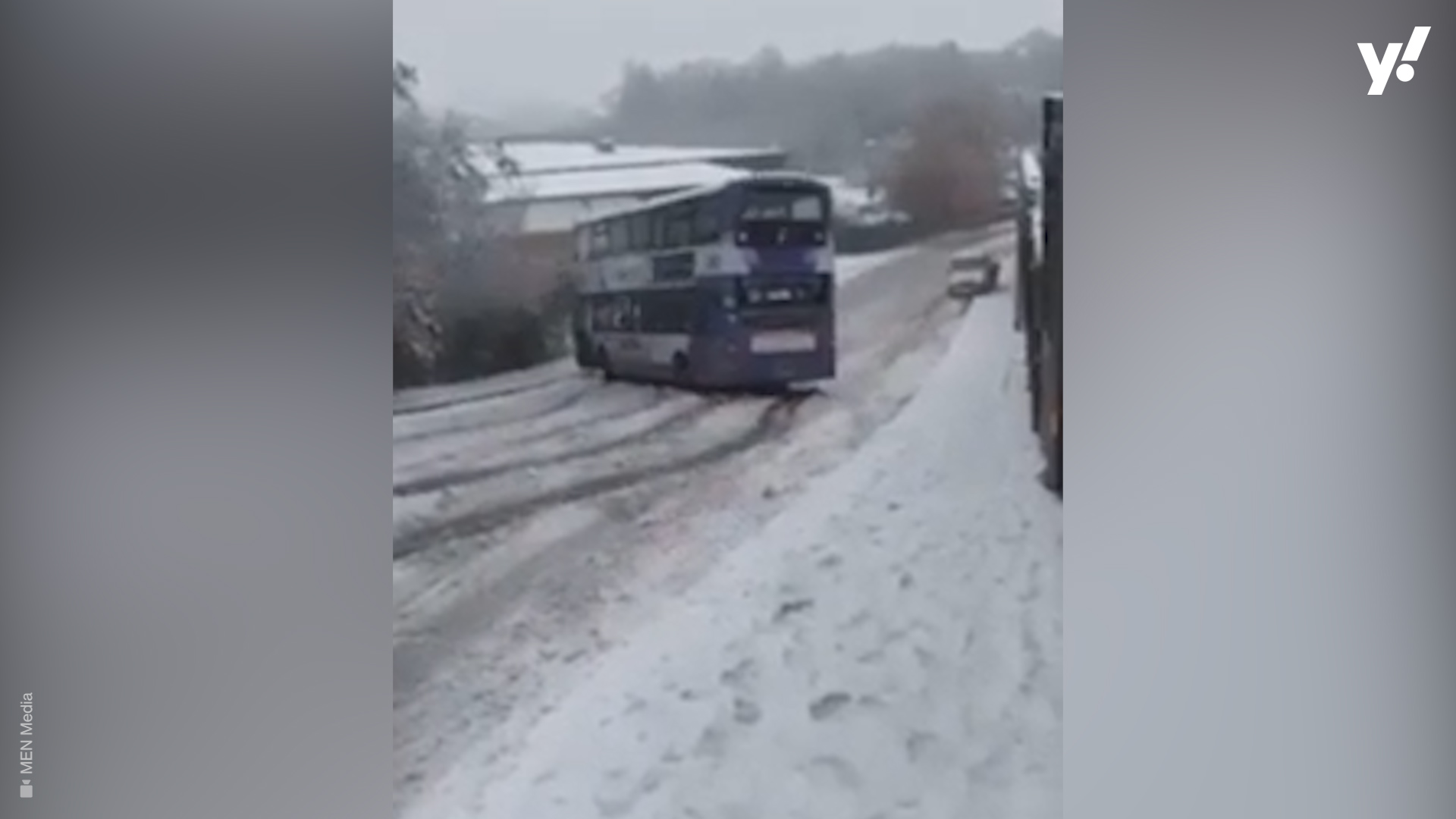 Double decker bus slides sideways down icy hill