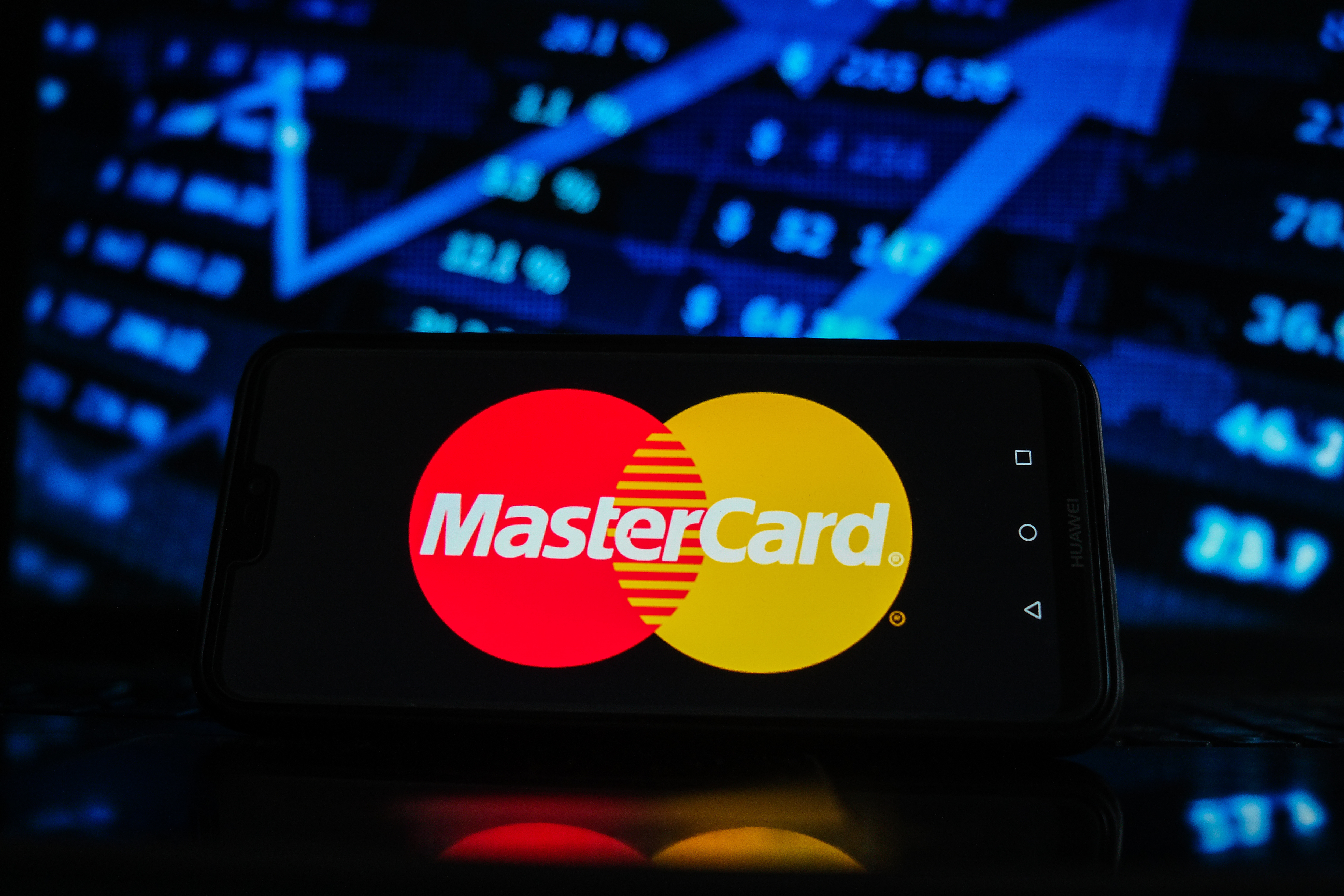 Mastercard say dem go begin support select cryptocurrencies dis year