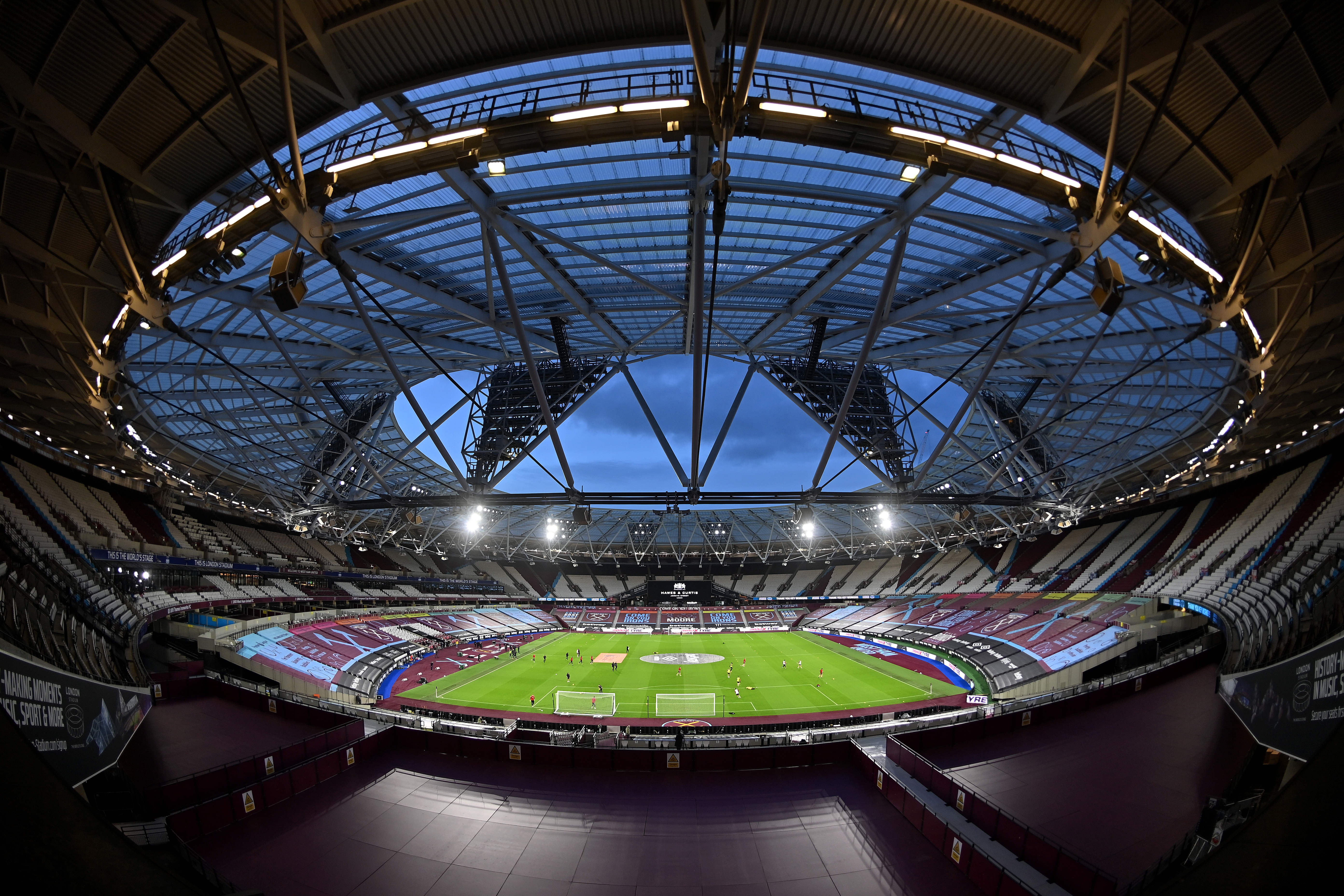 <p>LONDON, ENGLAND - FEBRUARY 15:  General view inside the stadium ahead of the Premier League match between West Ham United and Sheffield United at London Stadium on February 15, 2021 in London, England. Sporting stadiums around the UK remain under strict restrictions due to the Coronavirus Pandemic as Government social distancing laws prohibit fans inside venues resulting in games being played behind closed doors. (Photo by Justin Setterfield/Getty Images)</p>
