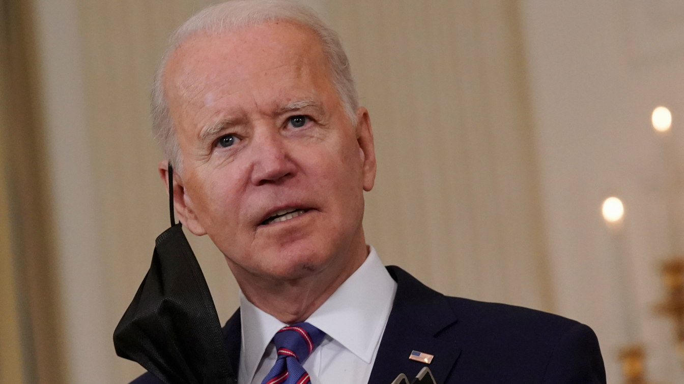 The CDC says travel by vaccinated Americans is “low risk” as Biden recommends caution amid rising numbers of infections