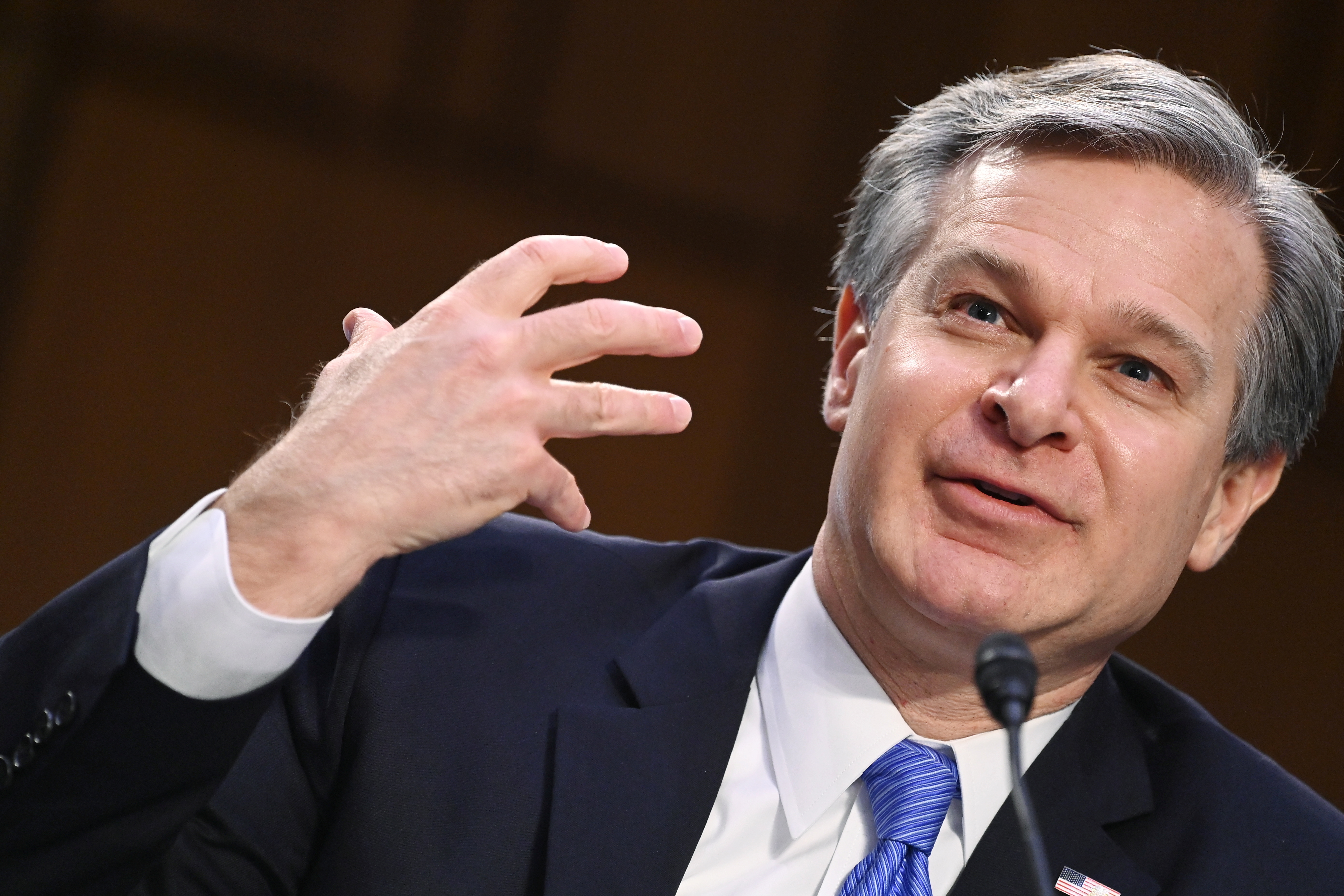 FBI director: Social media is 'key amplifier' of domestic extremism