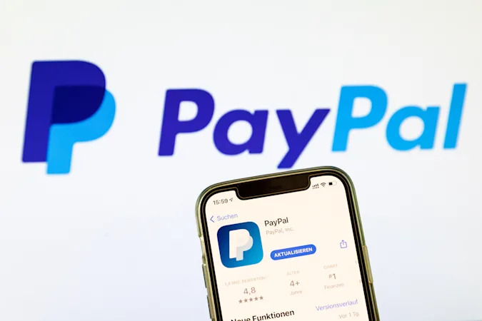 BARGTEHEIDE, GERMANY - MAY 04: (BILD ZEITUNG OUT) In this photo illustration, a PayPal App in the IOS App Store on May 04, 2021 in Bargteheide, Germany. (Photo by Katja Knupper/Die Fotowerft/DeFodi Images via Getty Images)
