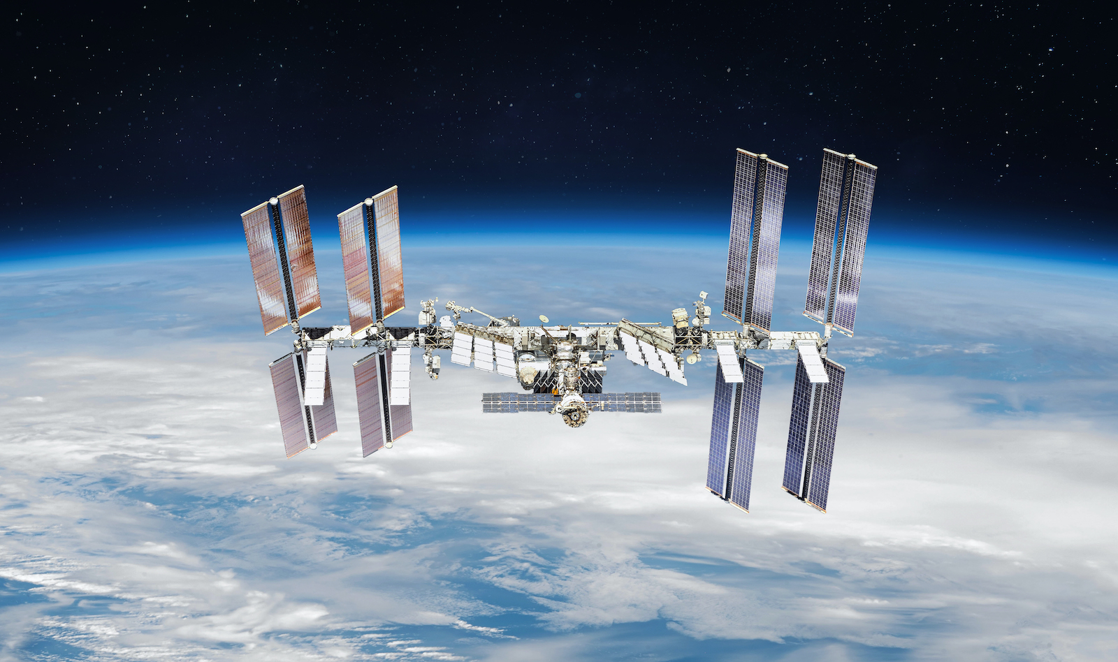 International space station on orbit of the Earth planet. View from outer space.ISS. Earth with clouds and blue sky. Elements of this image furnished by NASA