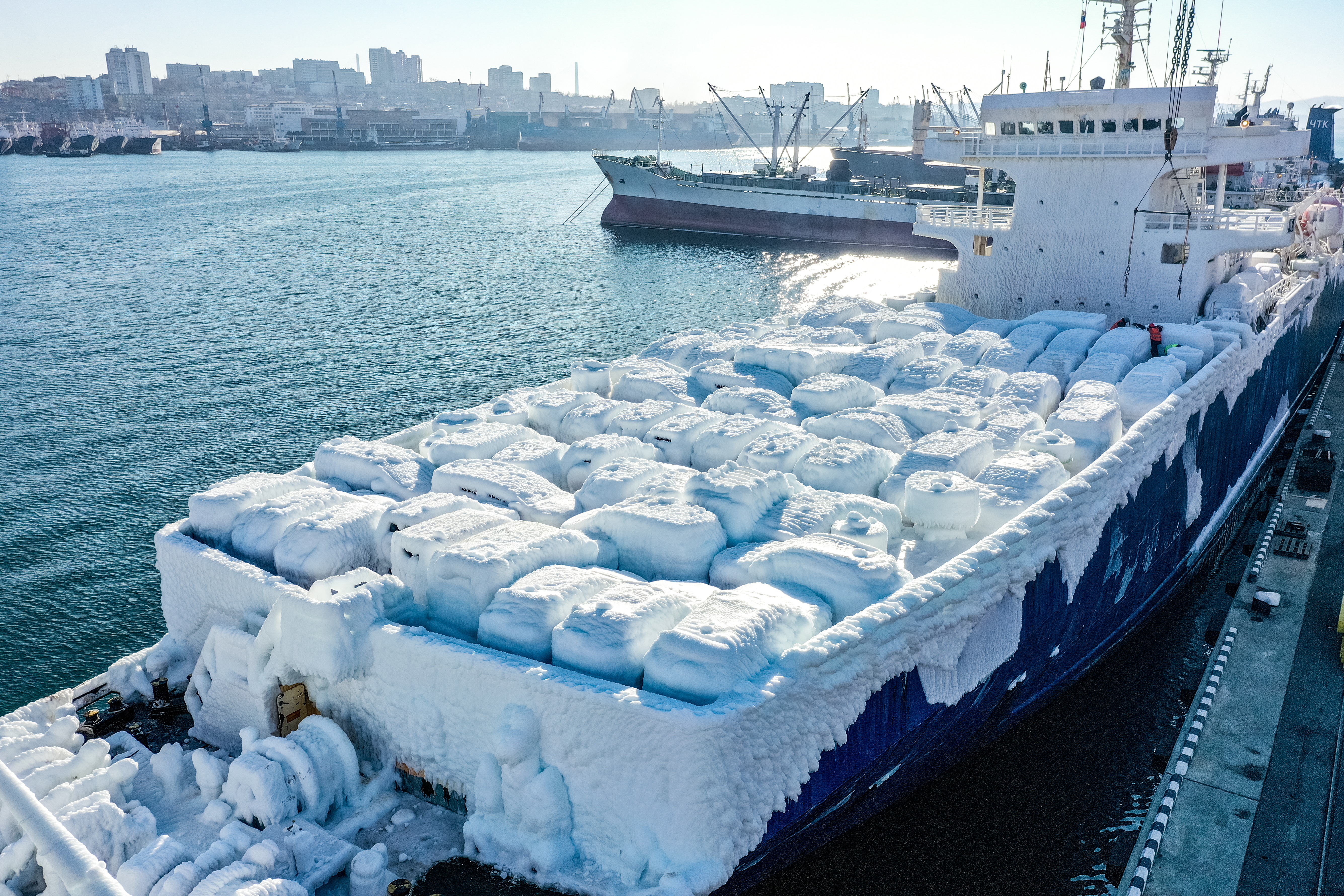 VLADIVOSTOK, RUSSIA  DECEMBER 28, 2021: A view of an ice-covered Sun Rio cargo ship carrying second hand cars from Japan in the port of Vladivostok. Ship icing occurs due to a humid sea wind, waves and sub-zero air temperatures which leads to an increase in draft, heeling and can increase the risk of a ship's overturn. Yuri Smityuk/TASS (Photo by Yuri Smityuk\TASS via Getty Images)