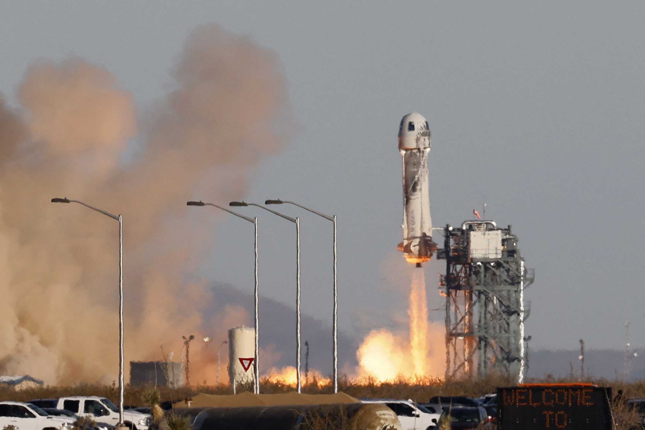 A Blue Origin New Shepard rocket lifts off with a crew of six, including Laura Shepard Churchley, the daughter of the first American in space Alan Shepard, for whom the spacecraft is named, from Launch Site One in west Texas, U.S. December 11, 2021. REUTERS/Joe Skipper