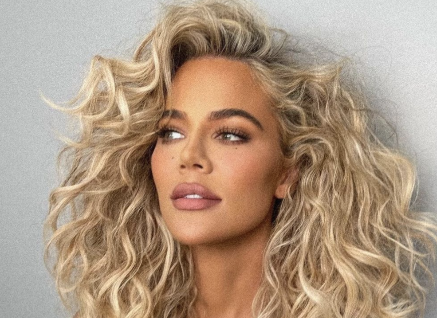 Khloé Kardashian shows off big curls and toned abs in latest Instagram