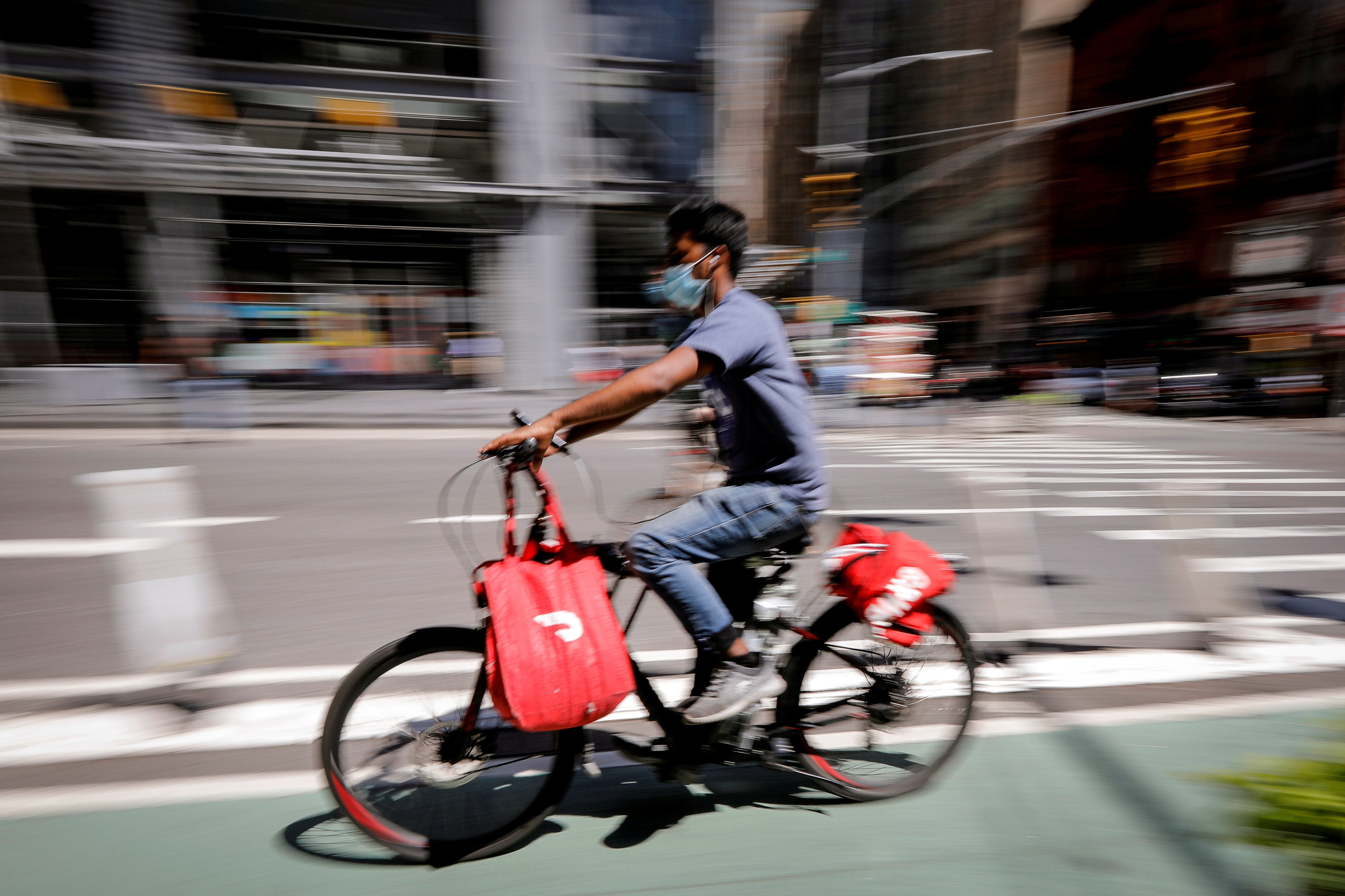 New York City sets an $18 per hour minimum wage for food delivery workers