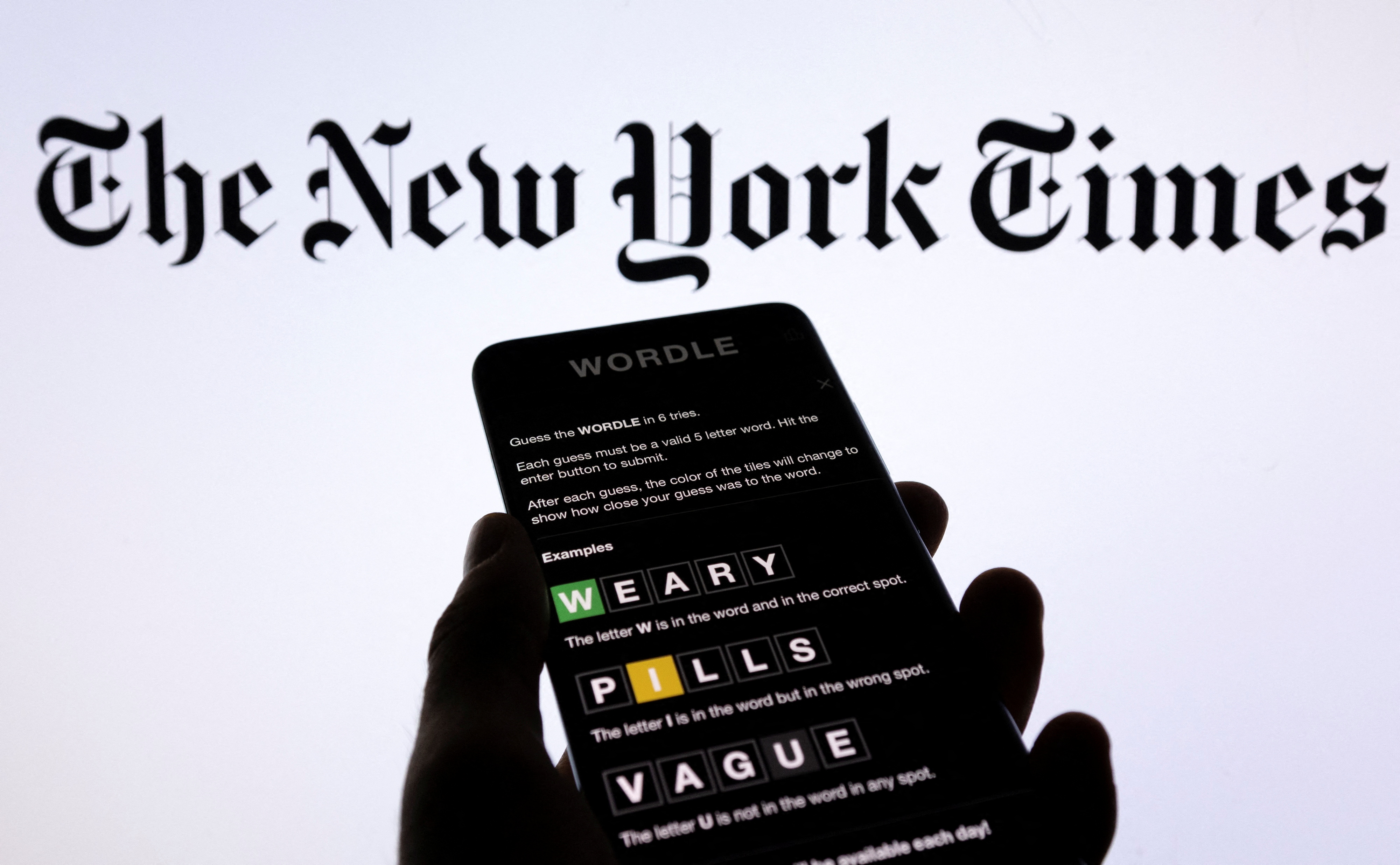 Wordle app game is seen on a smartphone in front of The New York Times logo in this picture illustration, February 1, 2022. Picutre taken February 1, 2022 REUTERS/Dado Ruvic/Illustration" data-uuid="4dd0acaf-c6ad-3124-8abb-59d3f9c2d7ba