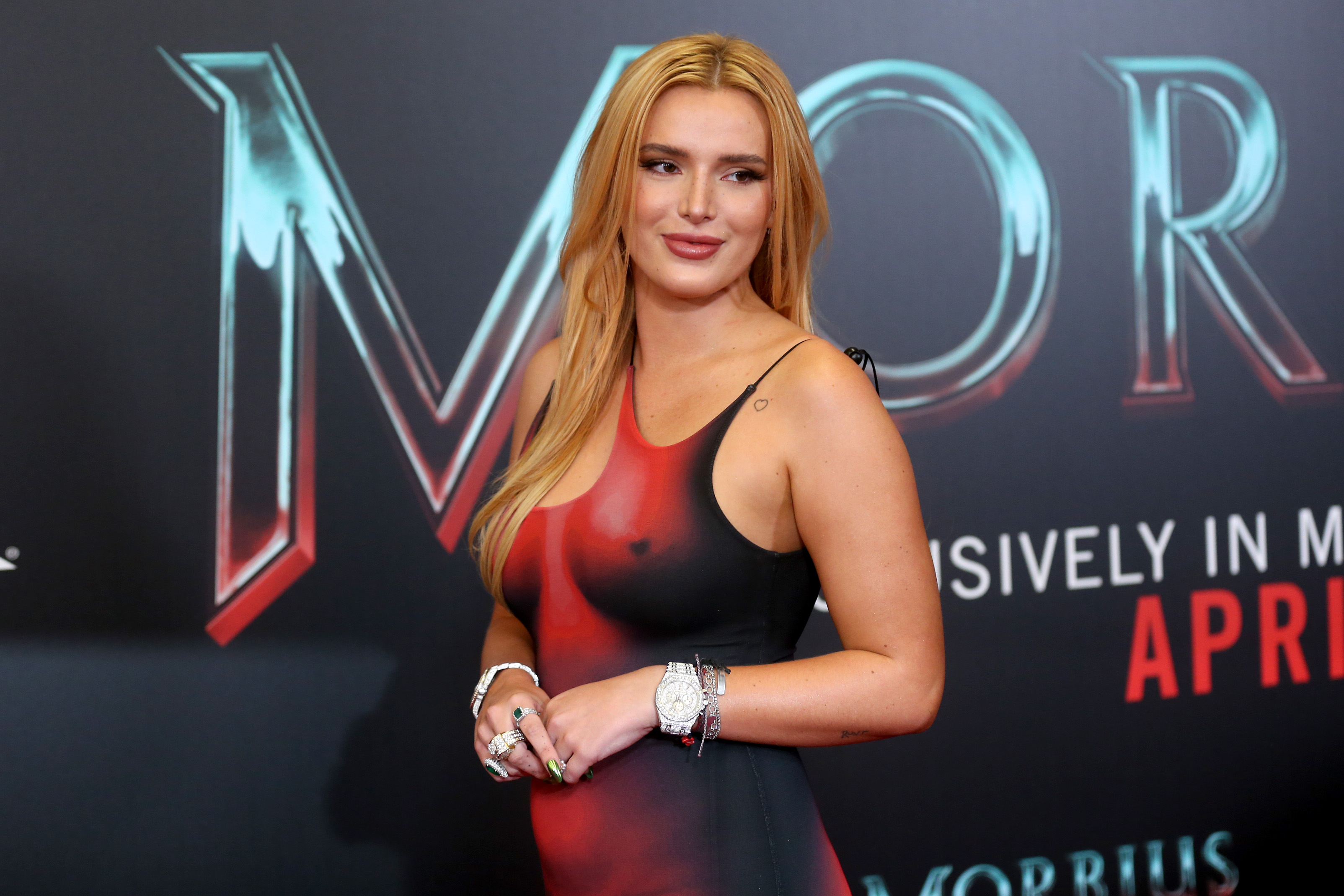 Bella Thorne poses in 'naked' dress for 'Morbius' red carpet