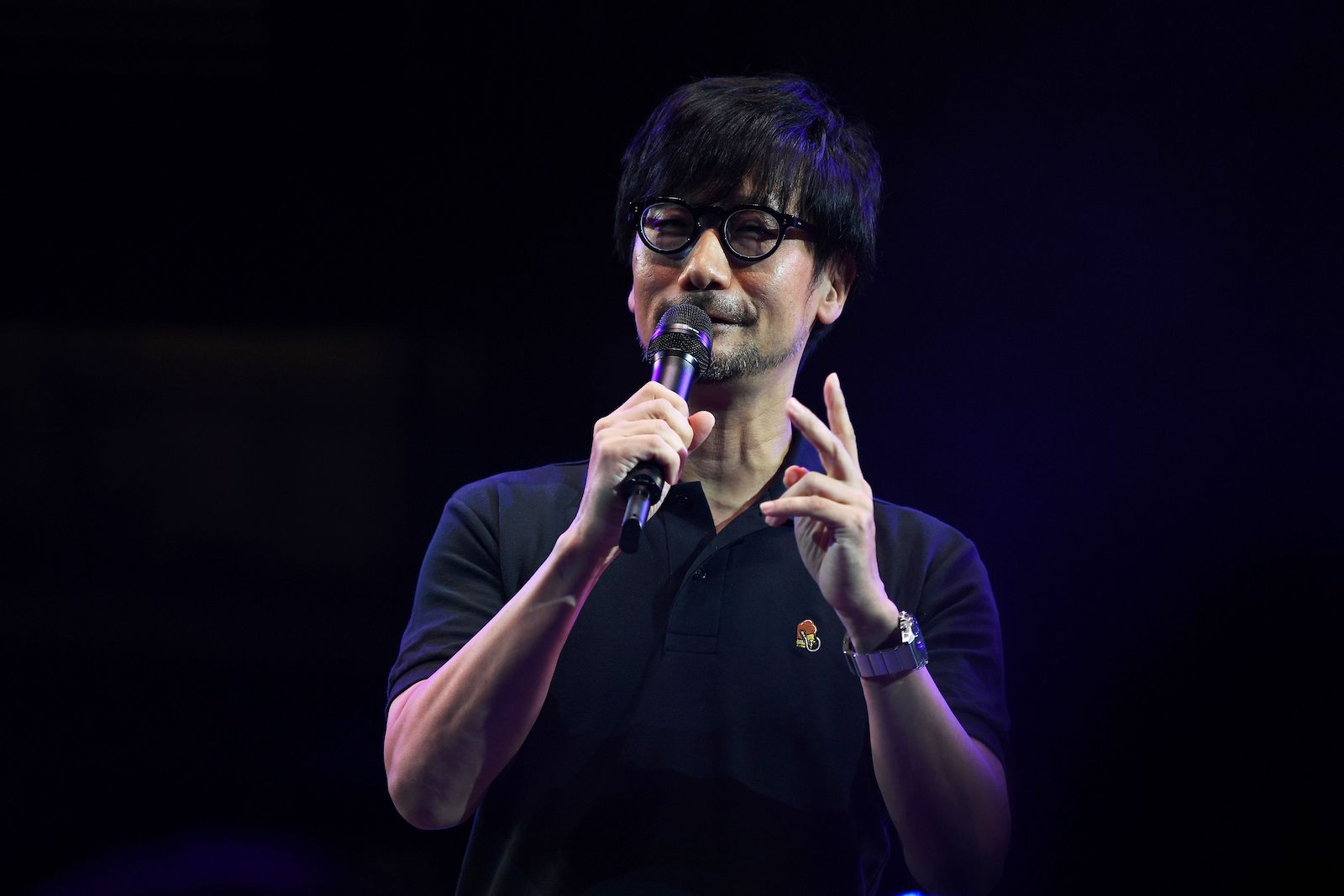 Japanese video game designer, writer, director and producer Hideo Kojima speaks on stage to present his new video game 