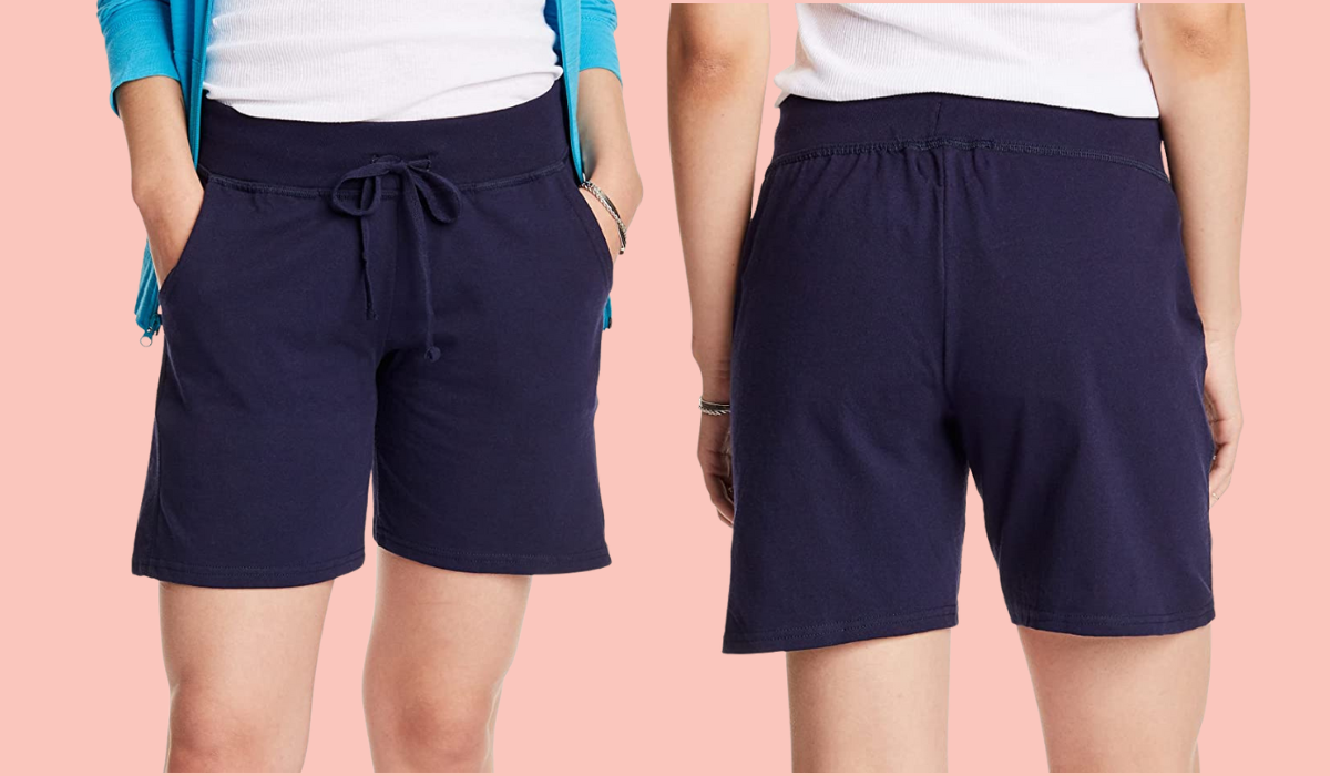 woman wearing navy shorts, front and back view