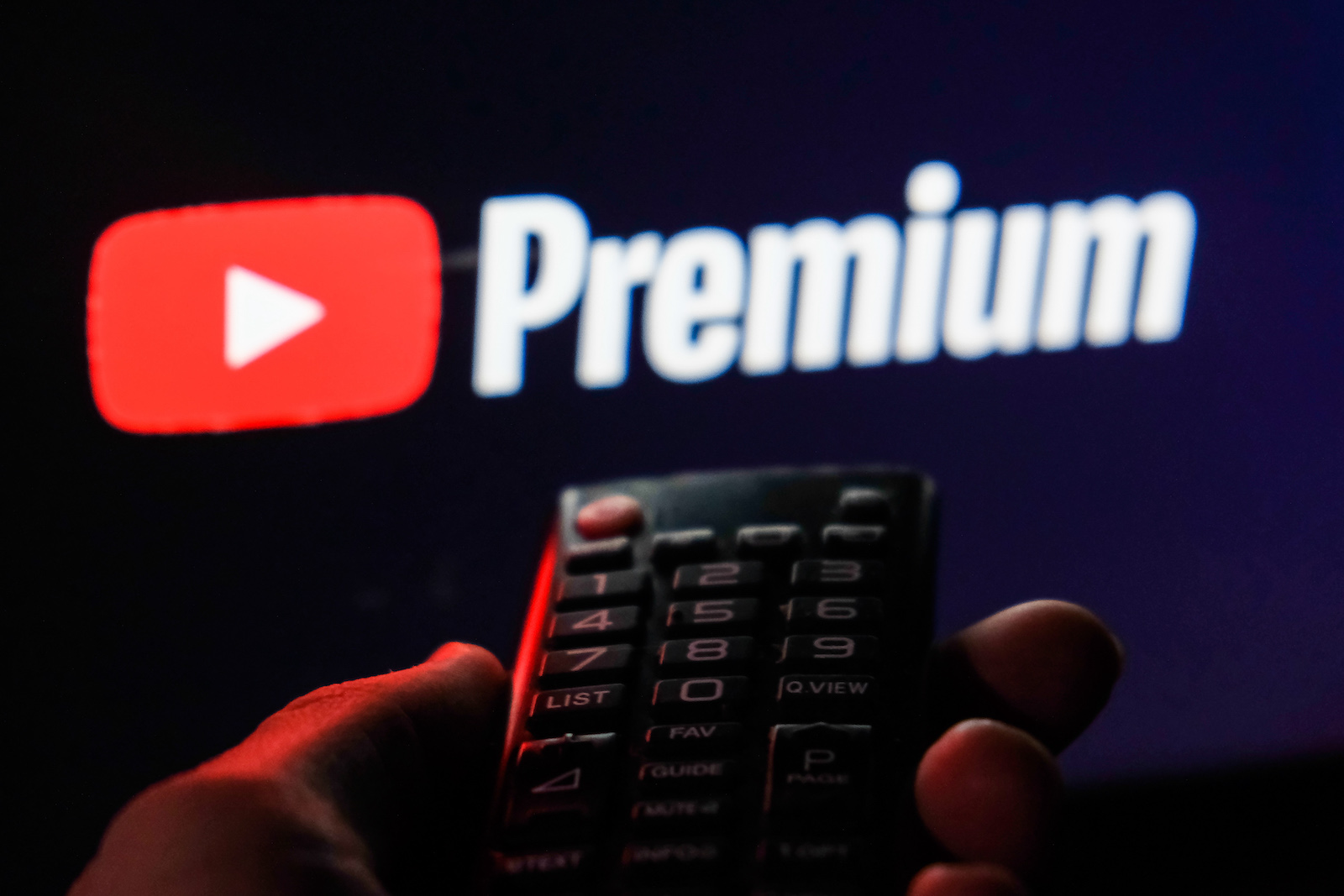 TV remote control is seen with YouTube Premium logo displayed on a screen in this illustration photo taken in Krakow, Poland on February 6, 2022. (Photo by Jakub Porzycki/NurPhoto via Getty Images)