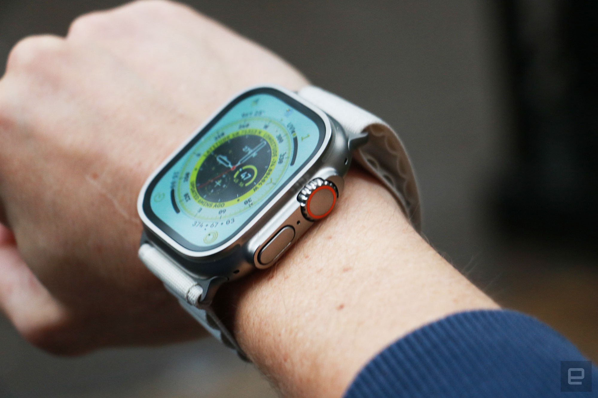 Off-angle view of the Apple Watch Ultra on a person's wrist, with the Wayfinder watch face on its screen." data-uuid="19eeb5b8-a935-36e2-94e9-1a9f828b2bd6